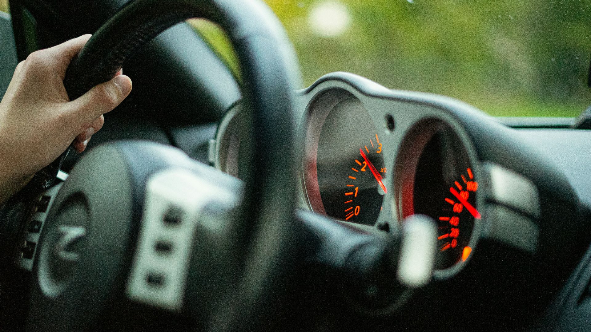 black and silver steering wheel
