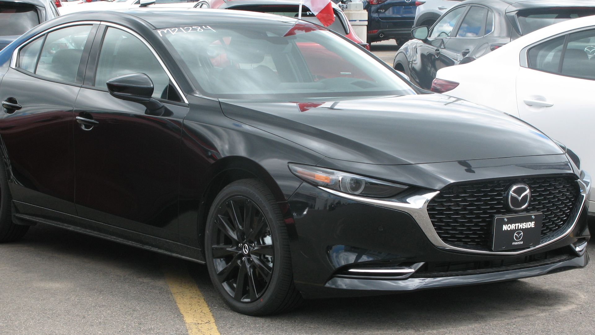 File:2021 Mazda3 GT Turbo AWD, Front Right, 07-01-2021.jpg