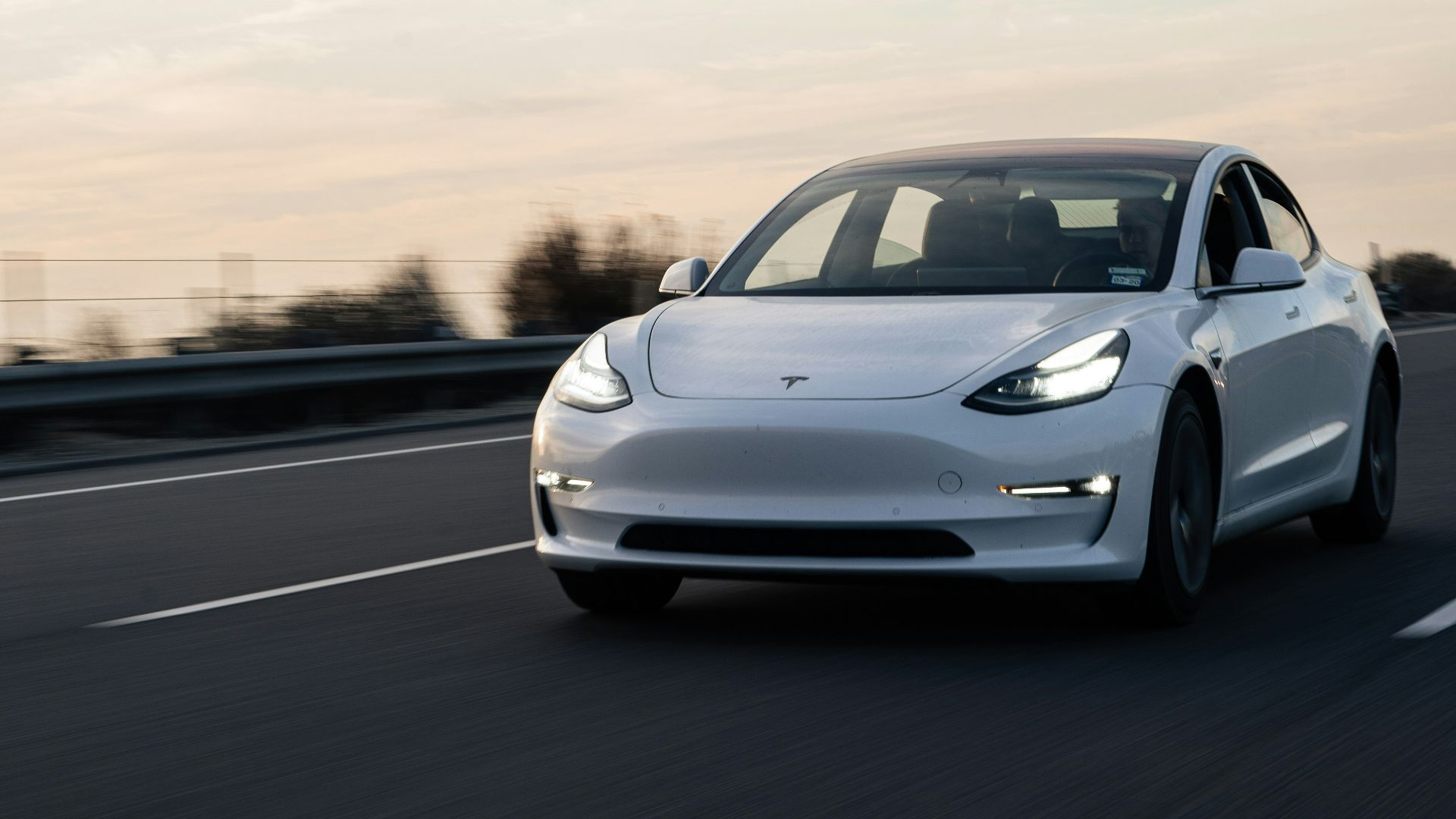 white bmw m 3 on road
