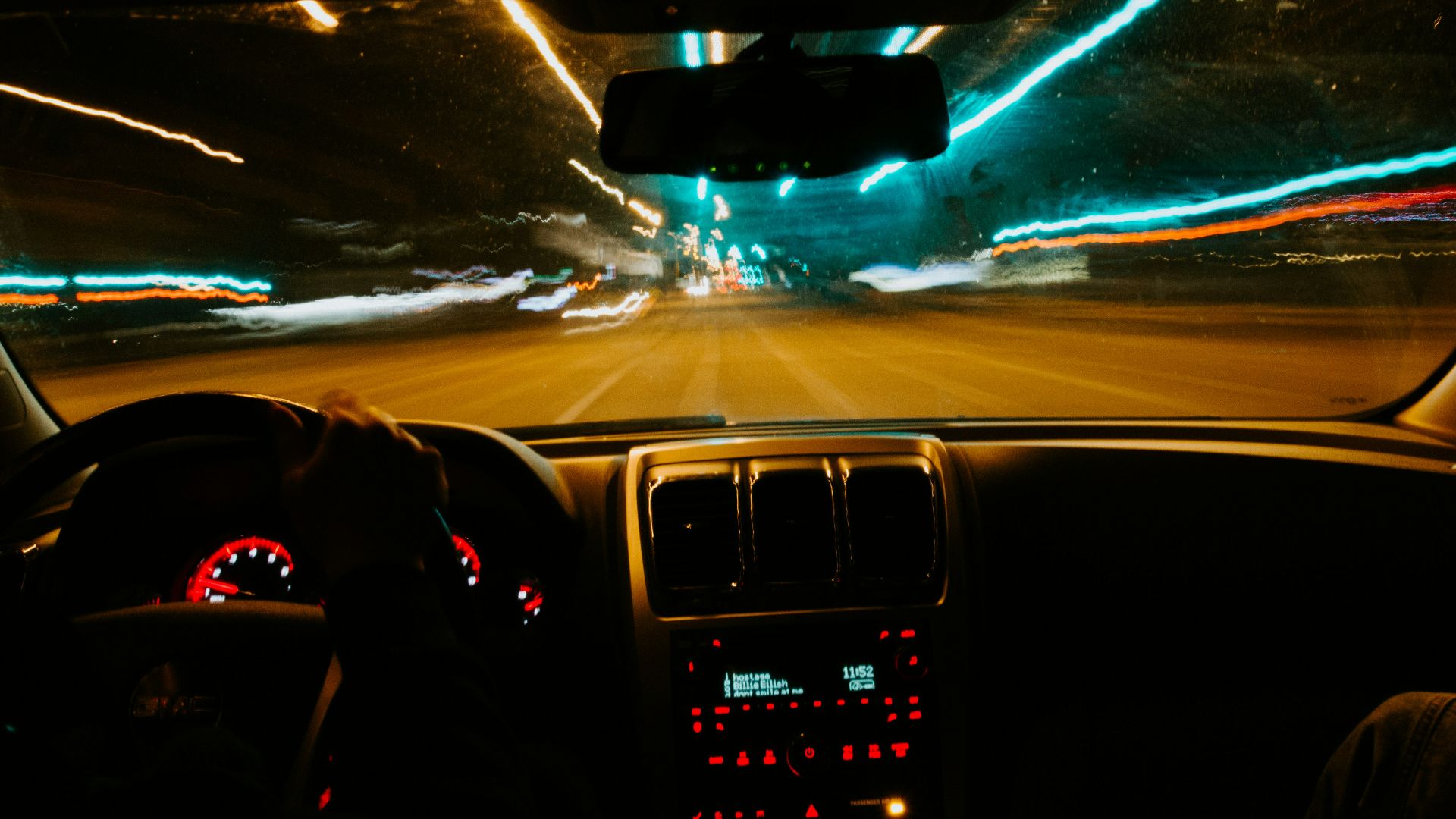 person driving car during night time