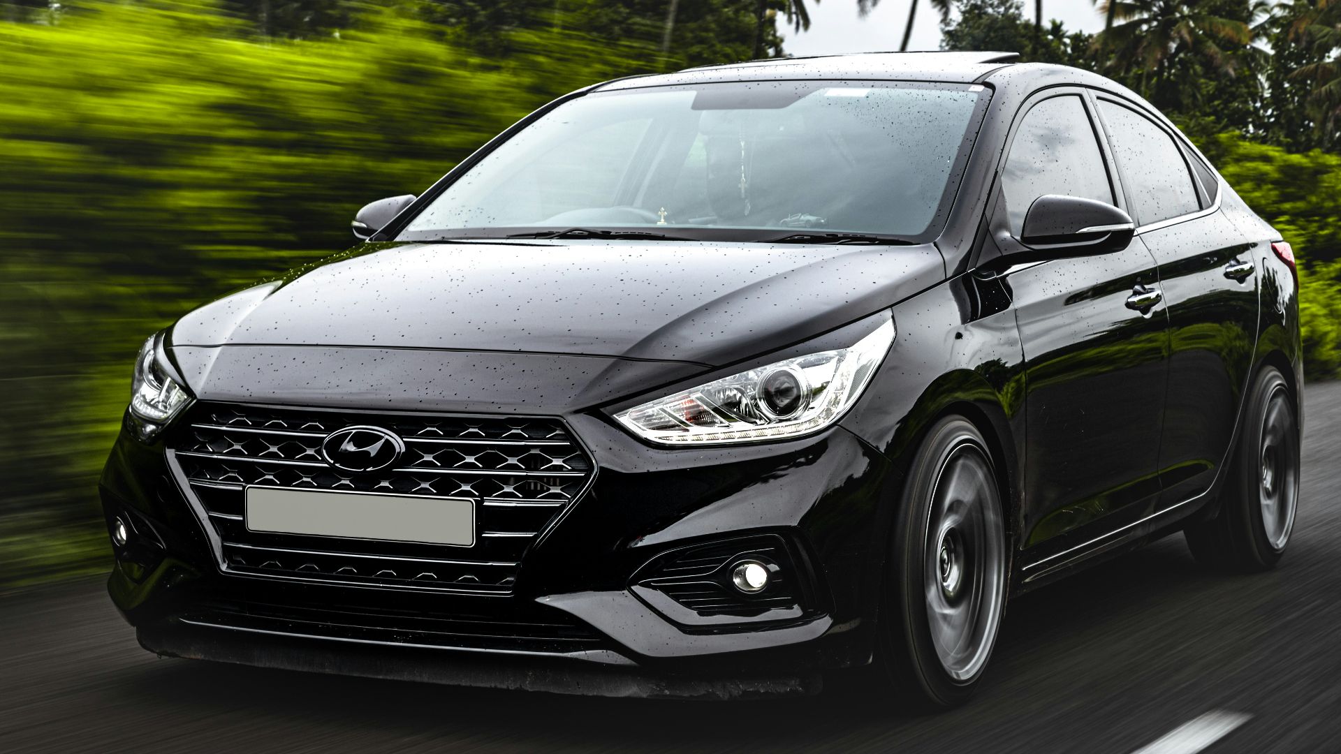 black mercedes benz c class on road during daytime