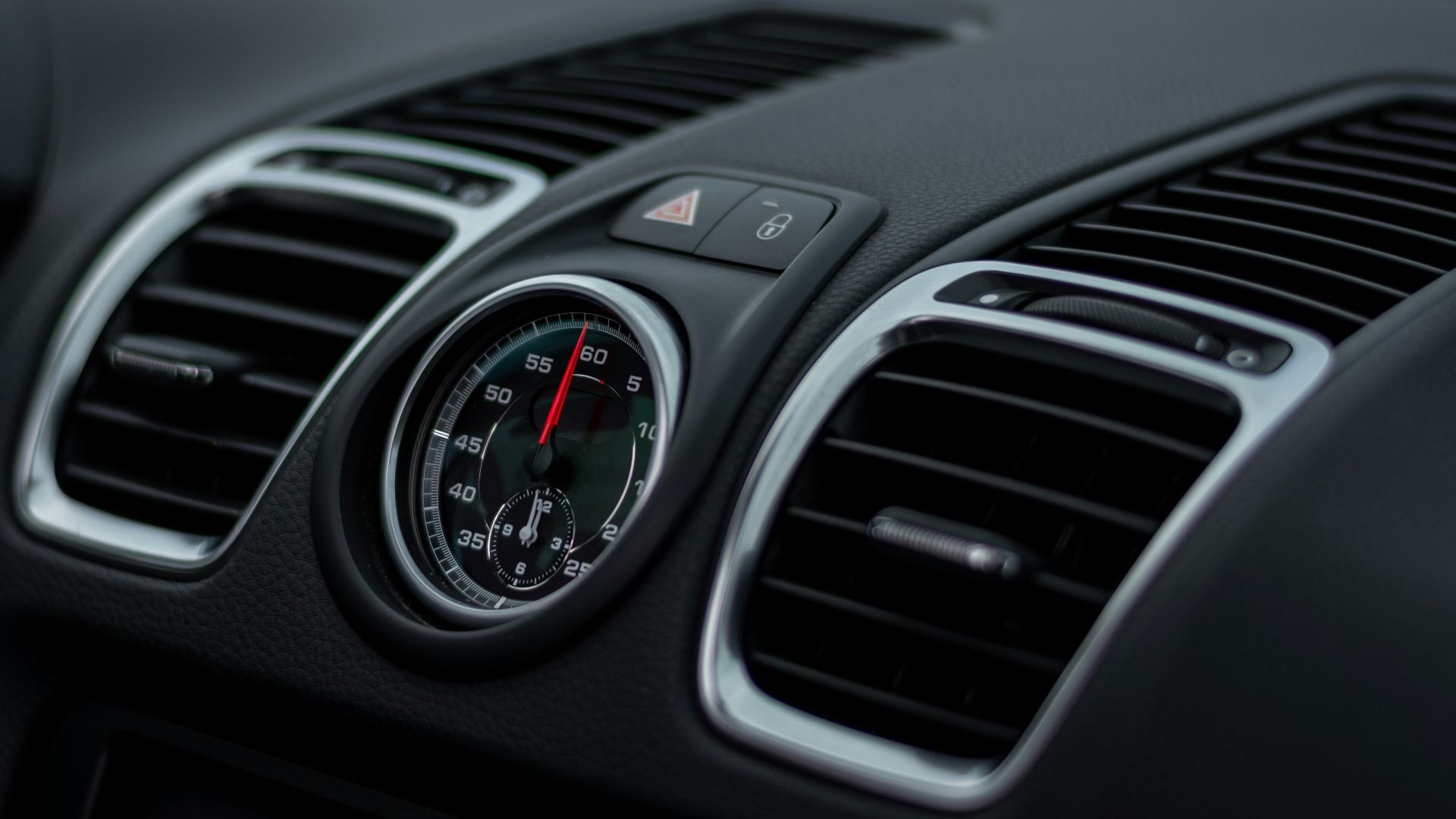 silver and black car air vent