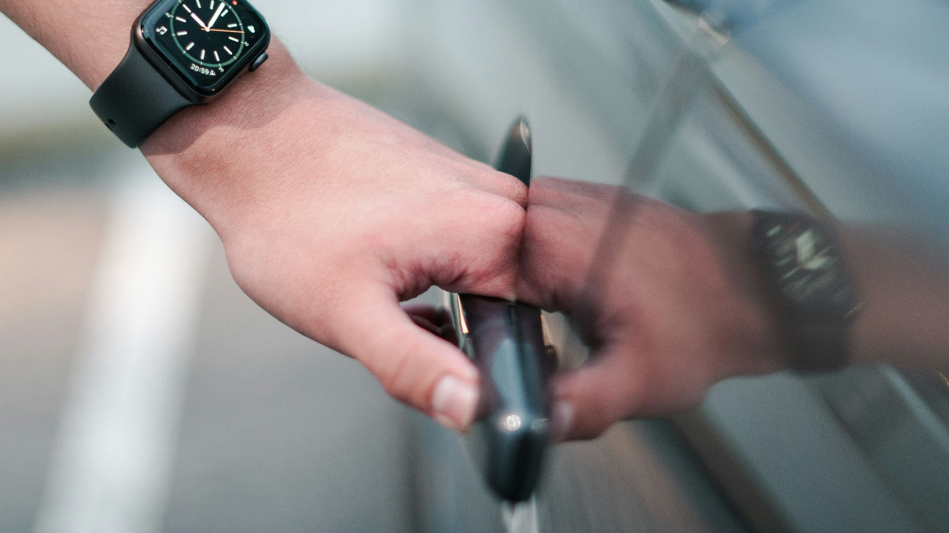 person wearing black digital watch