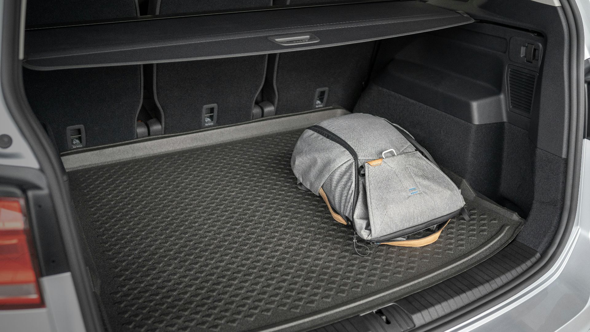 gray and yellow bag on car seat