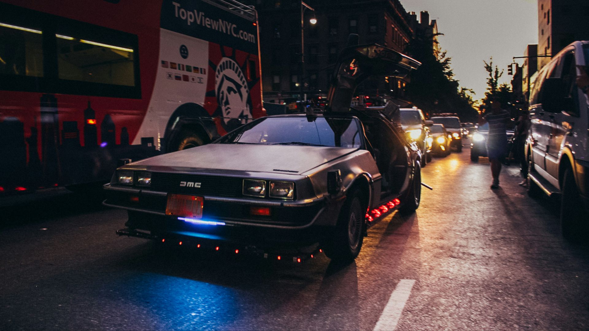 black porsche 911 parked on street during night time