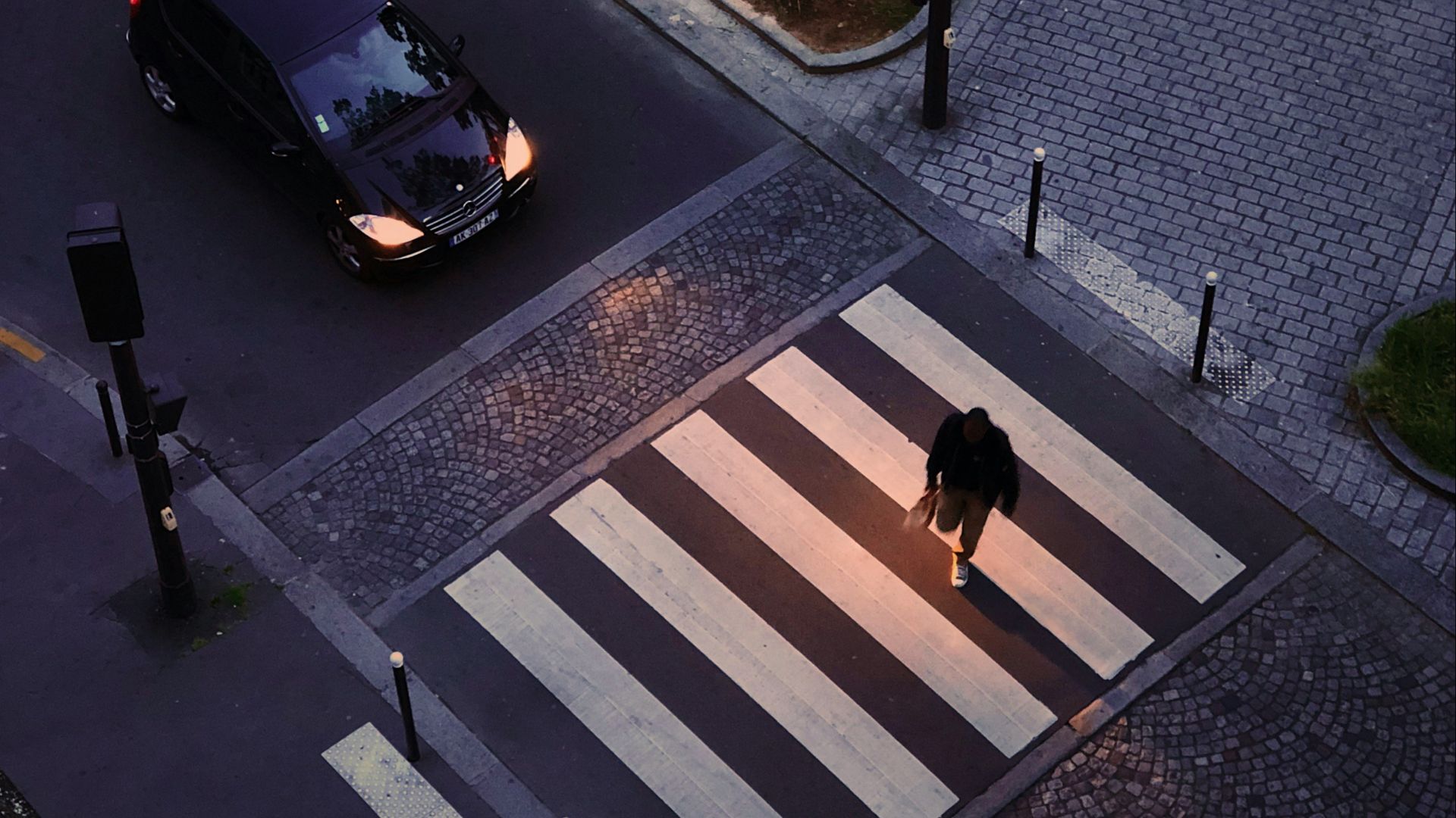 person crossing the pedestrian lane