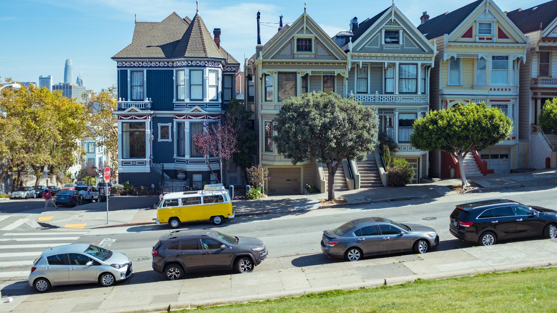 a group of cars parked on the side of a road