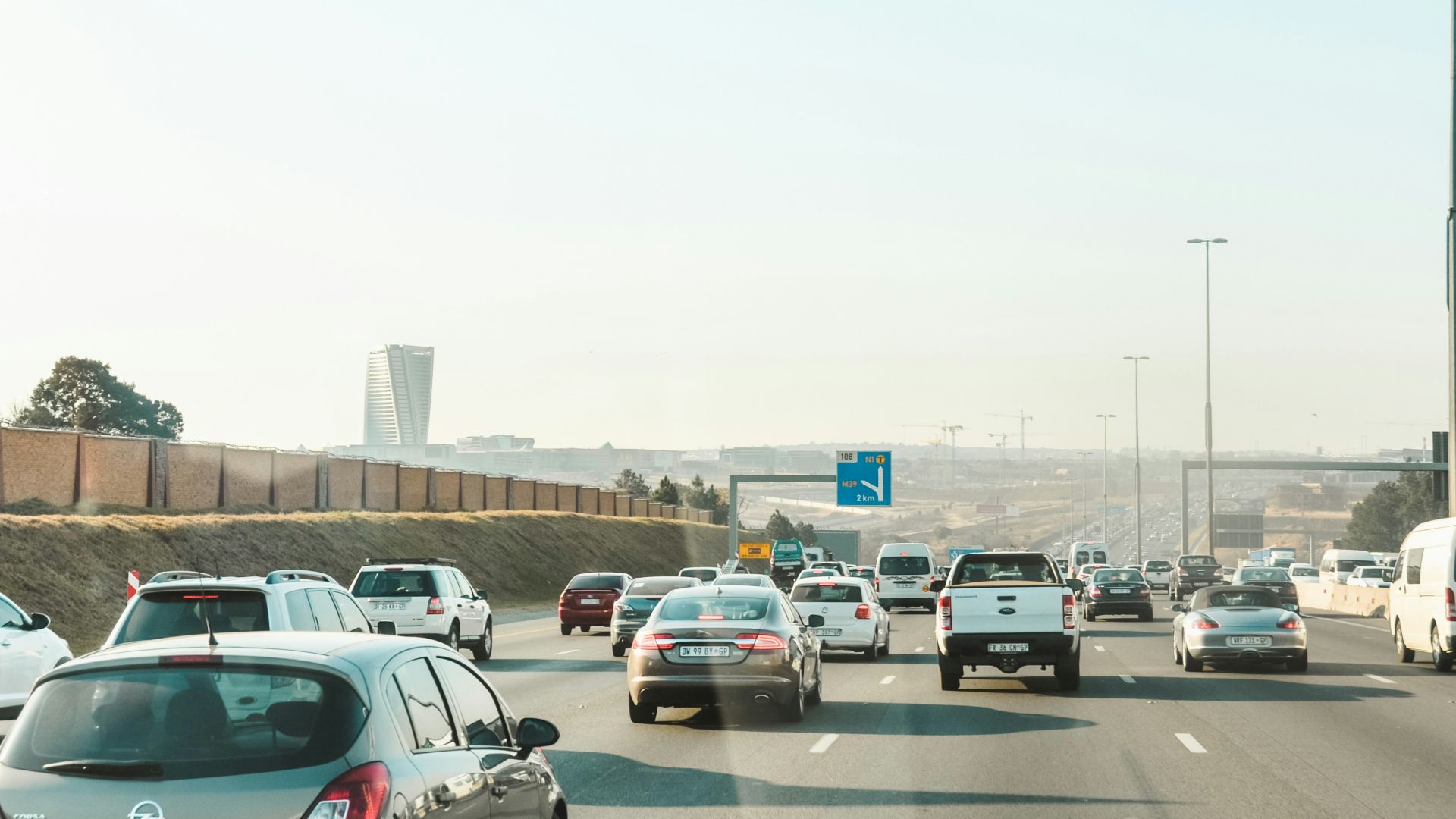 cars parked on parking lot during daytime