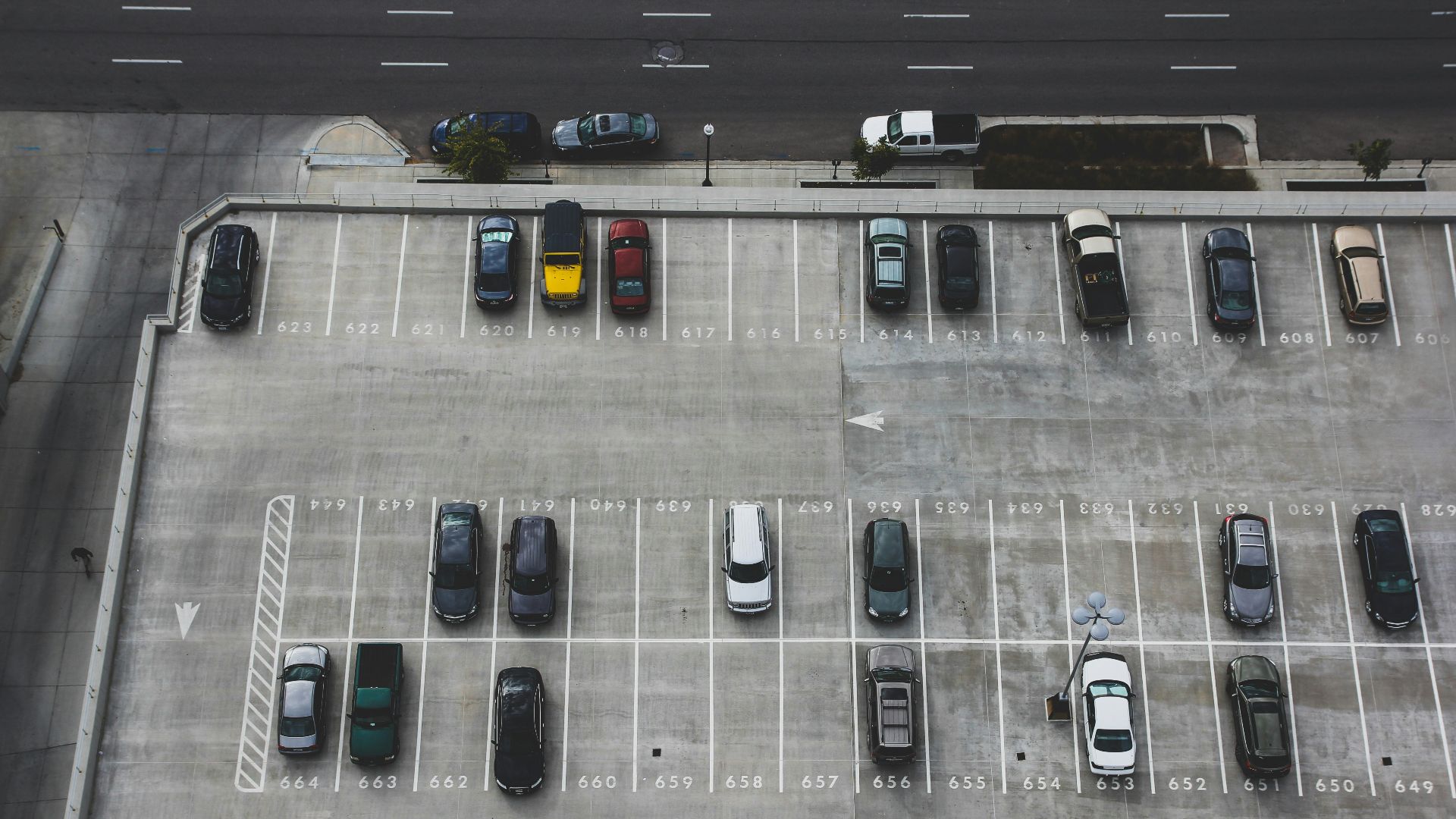 aerial view of cars parked on parking lot