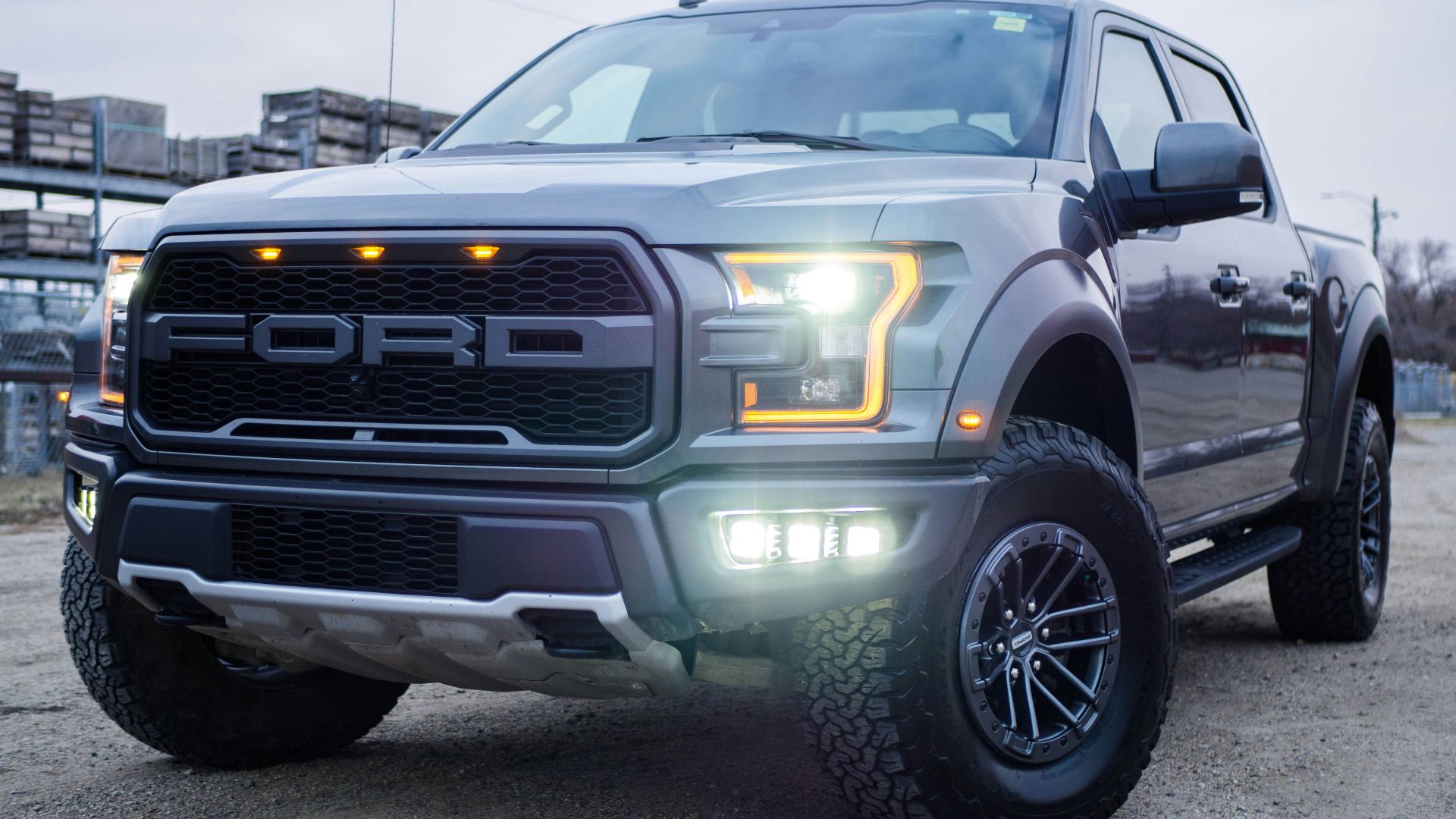 black chevrolet crew cab pickup truck on road during daytime