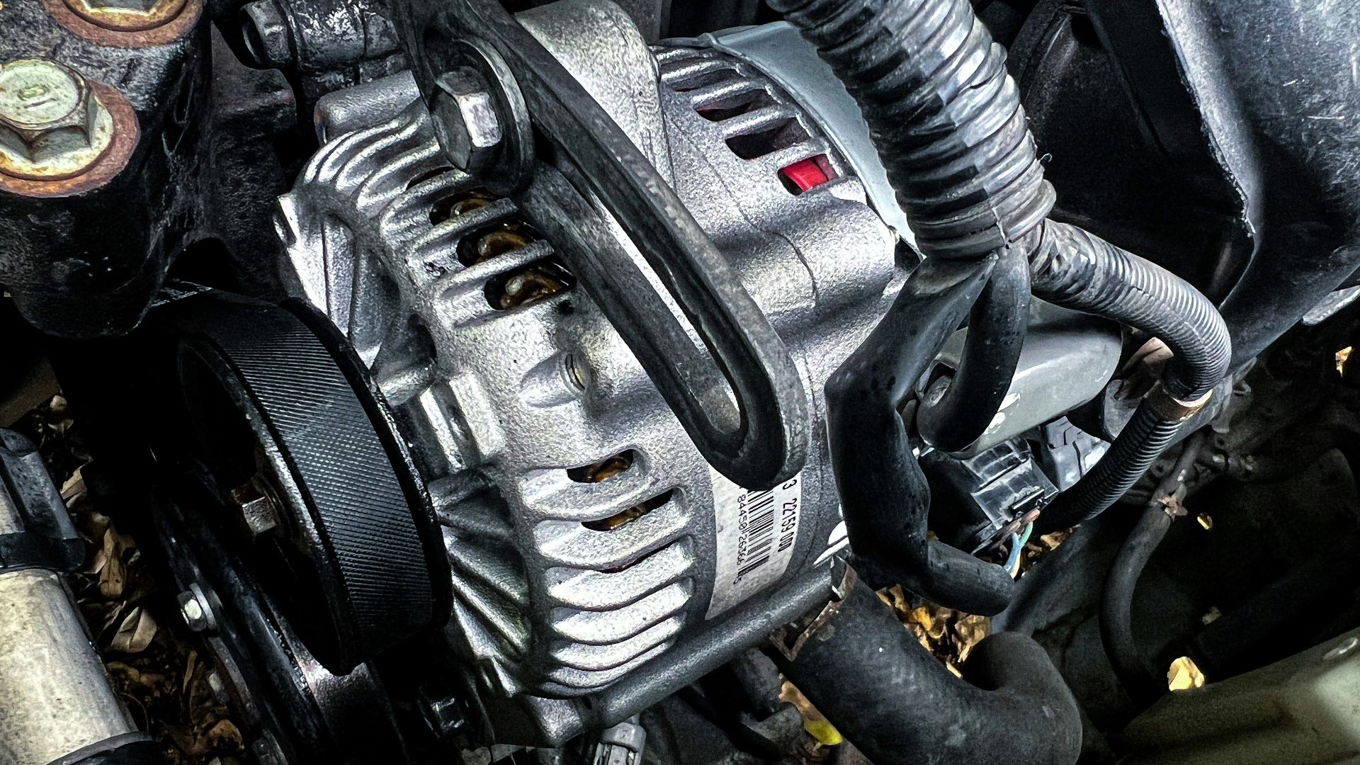 a car engine with a black hood