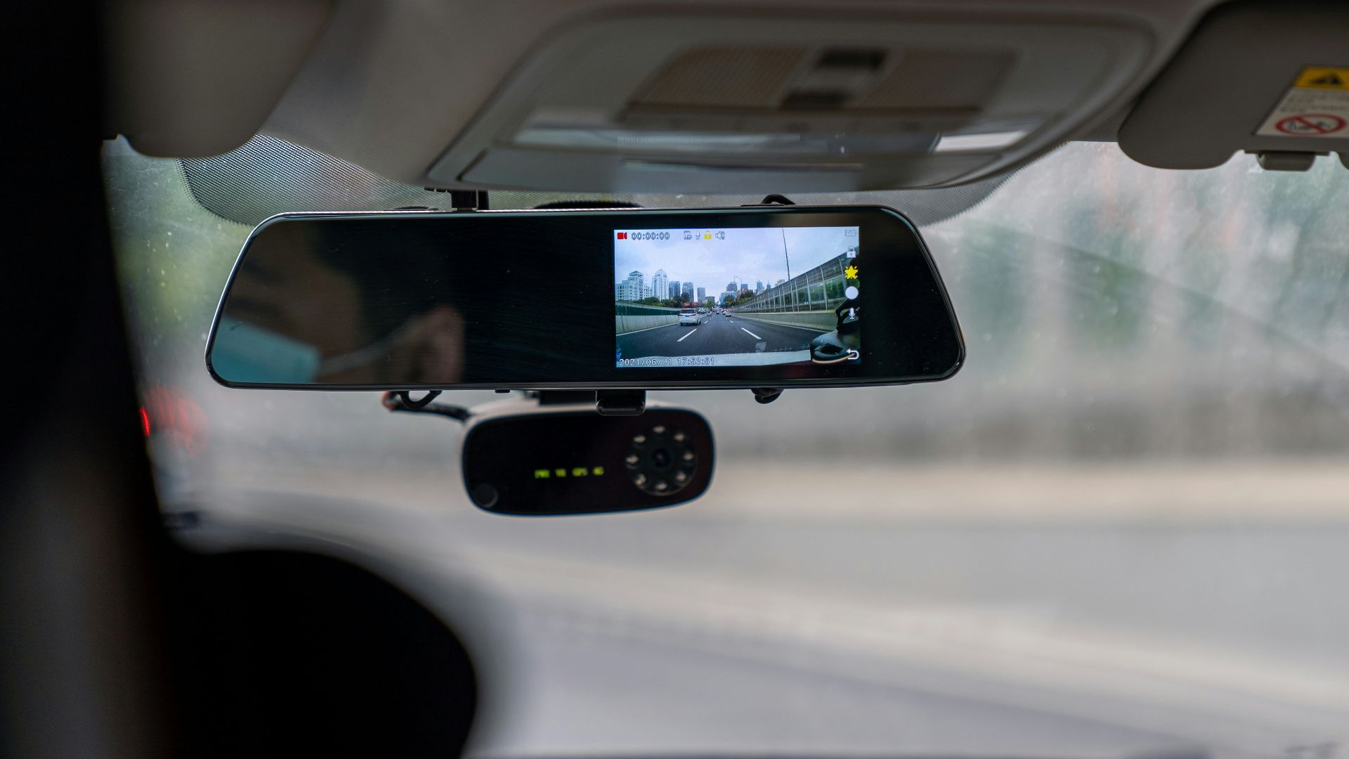 car side mirror with water droplets