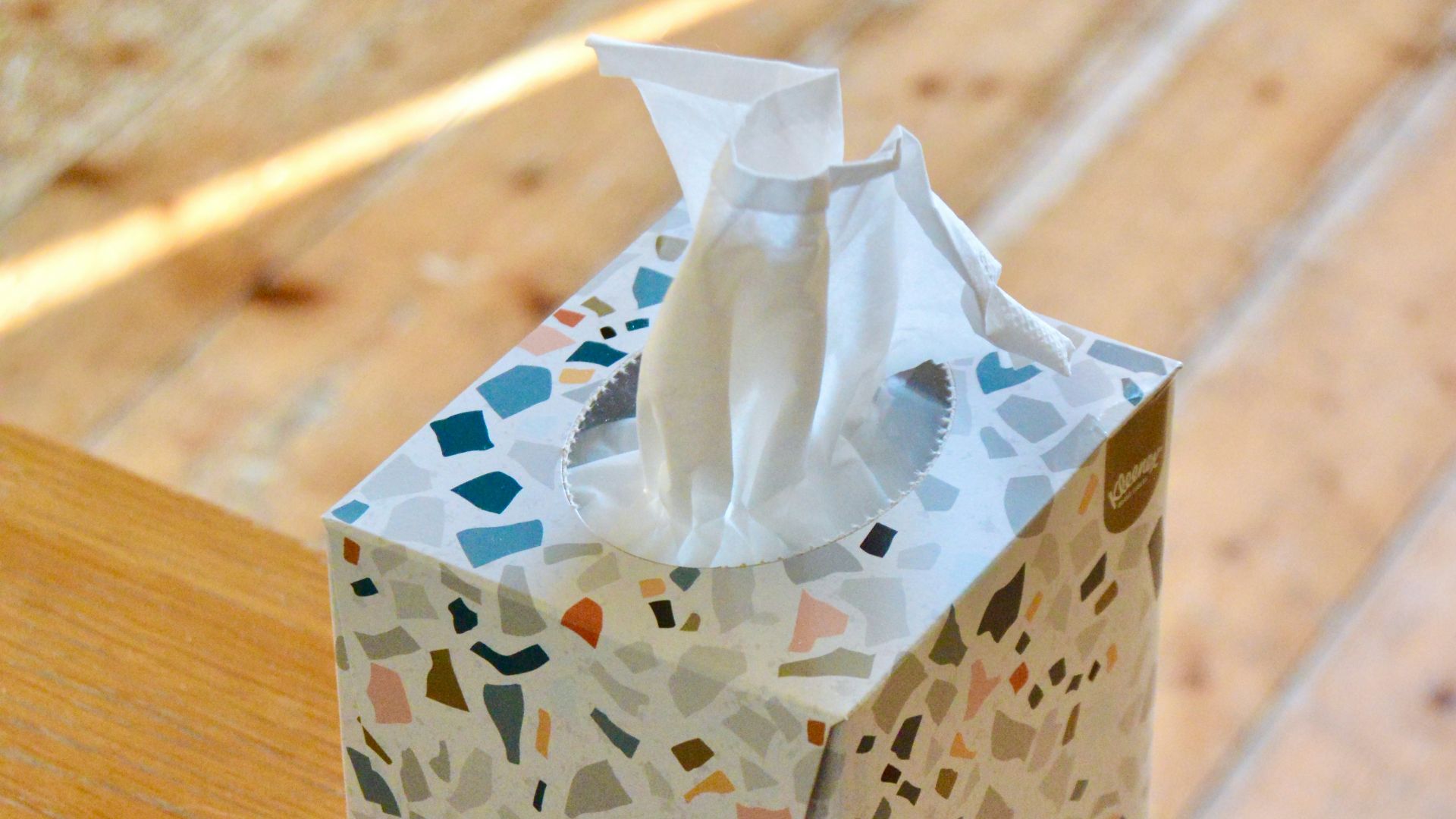 white and blue floral tissue box