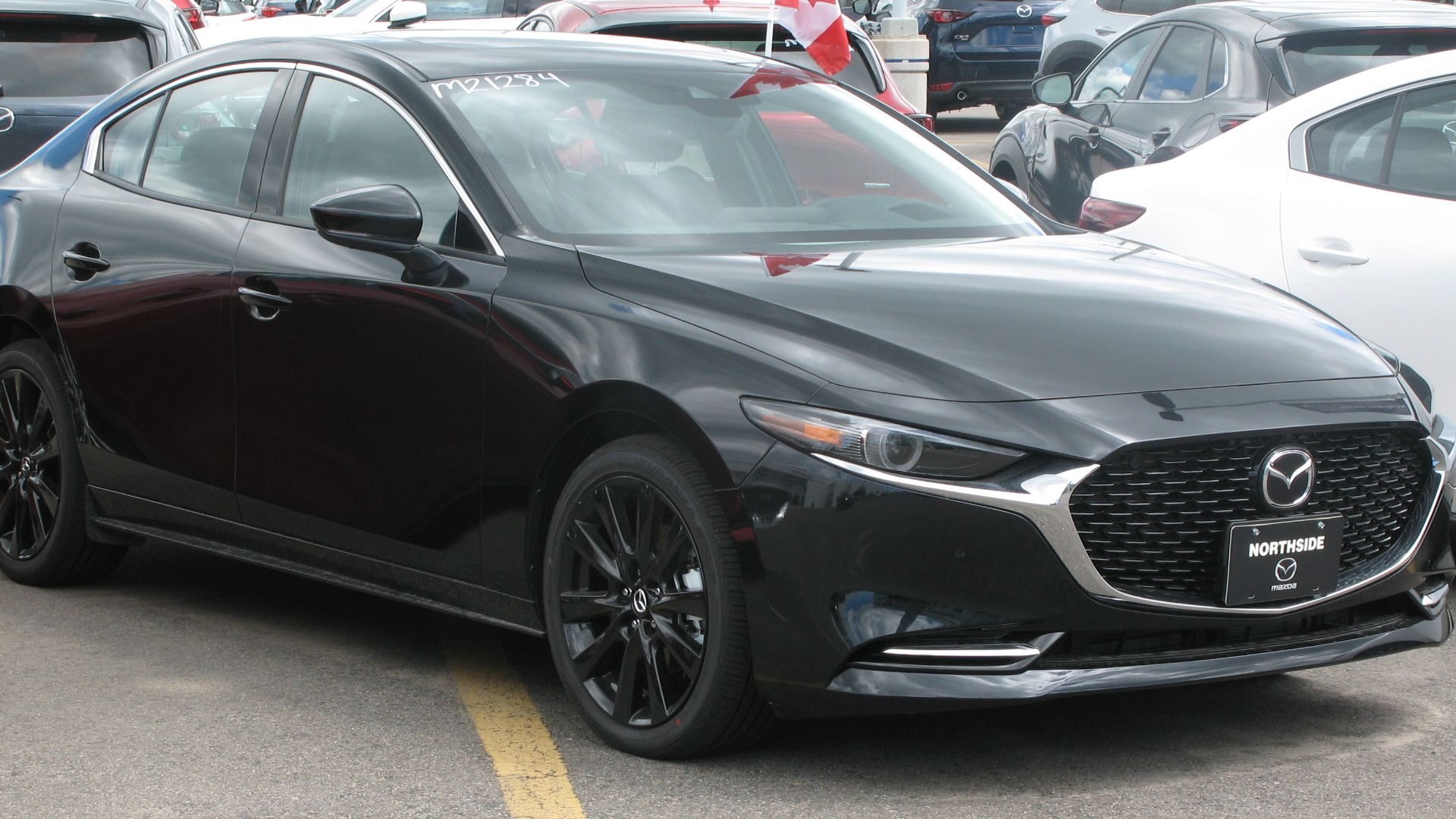 File:2021 Mazda3 GT Turbo AWD, Front Right, 07-01-2021.jpg