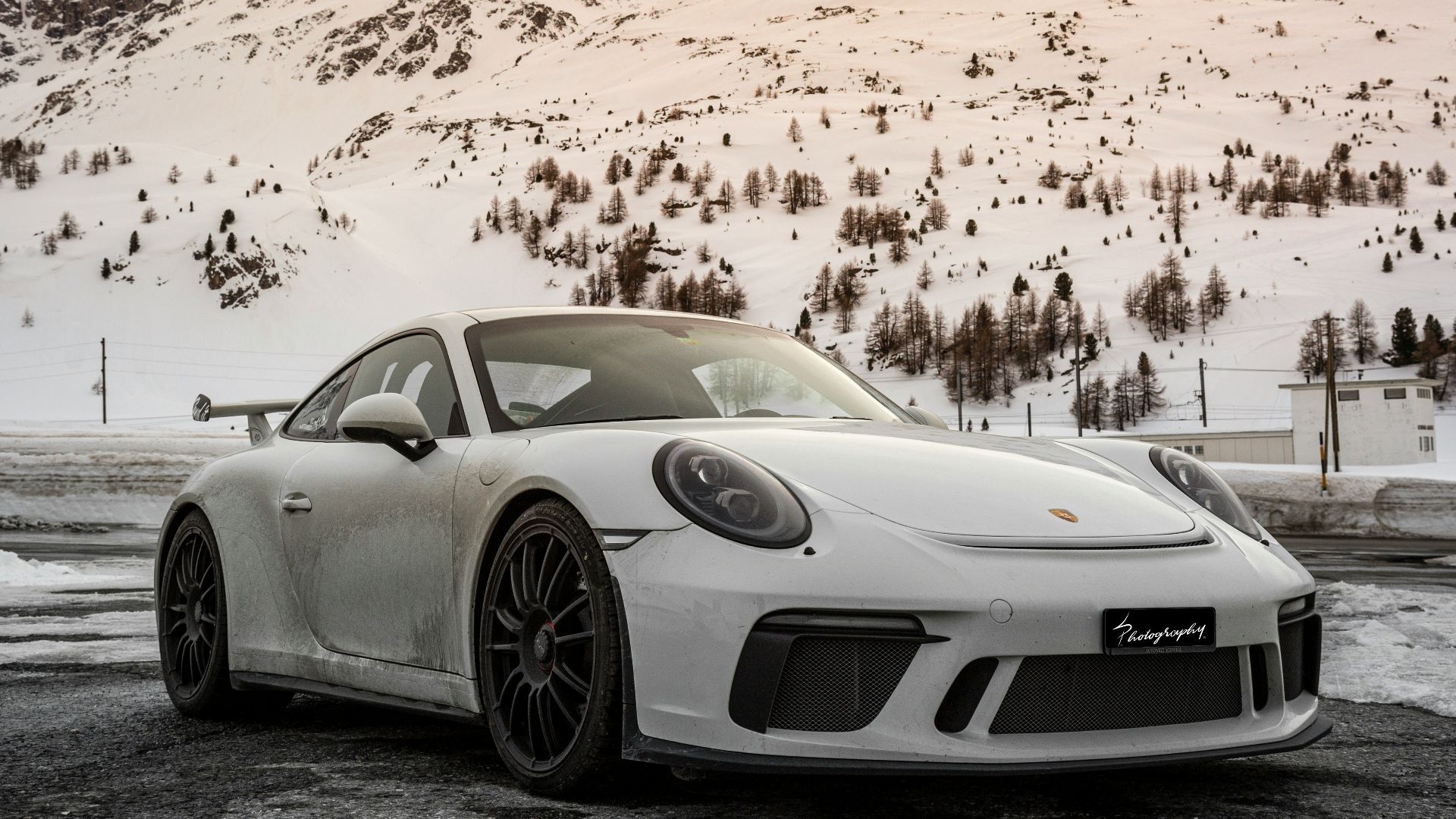 silver porsche 911 on road during daytime