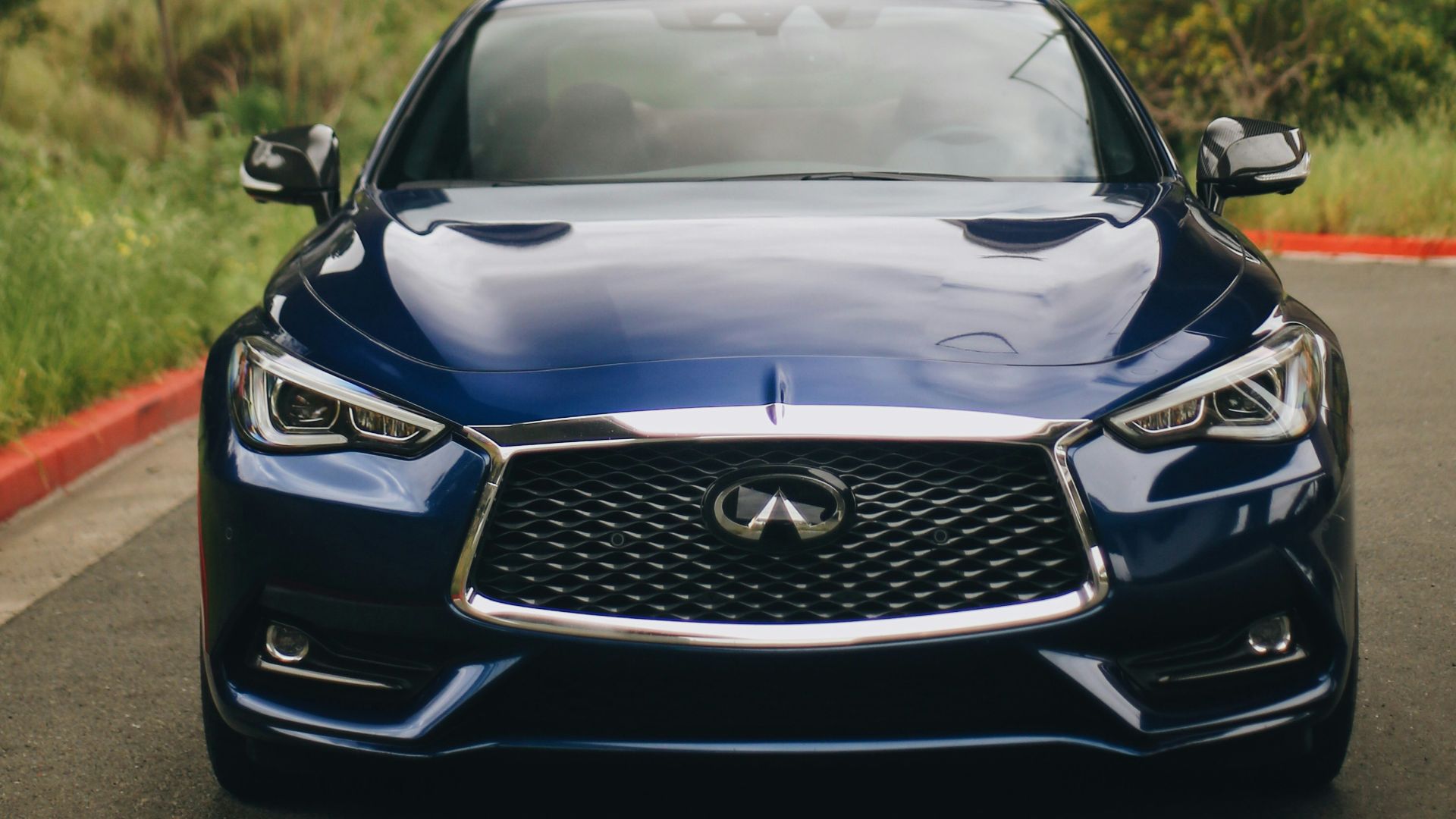 black bmw m 3 parked on gray asphalt road during daytime