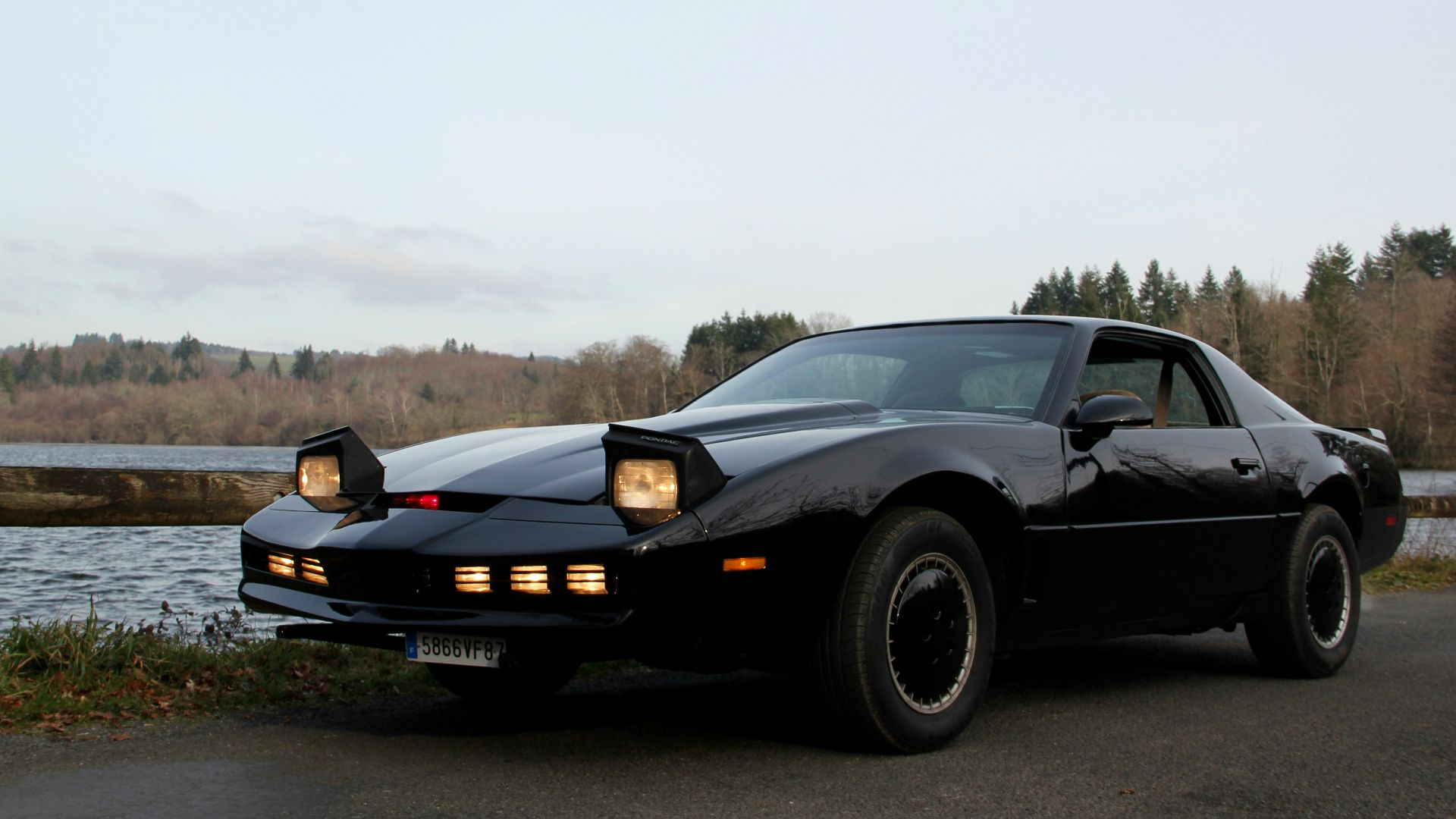 a black car parked on a road