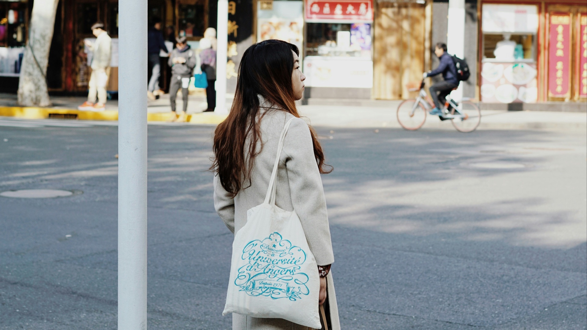 woman about to cross on crosswalk