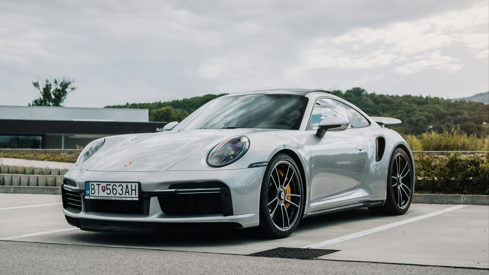 silver mercedes benz coupe on road during daytime
