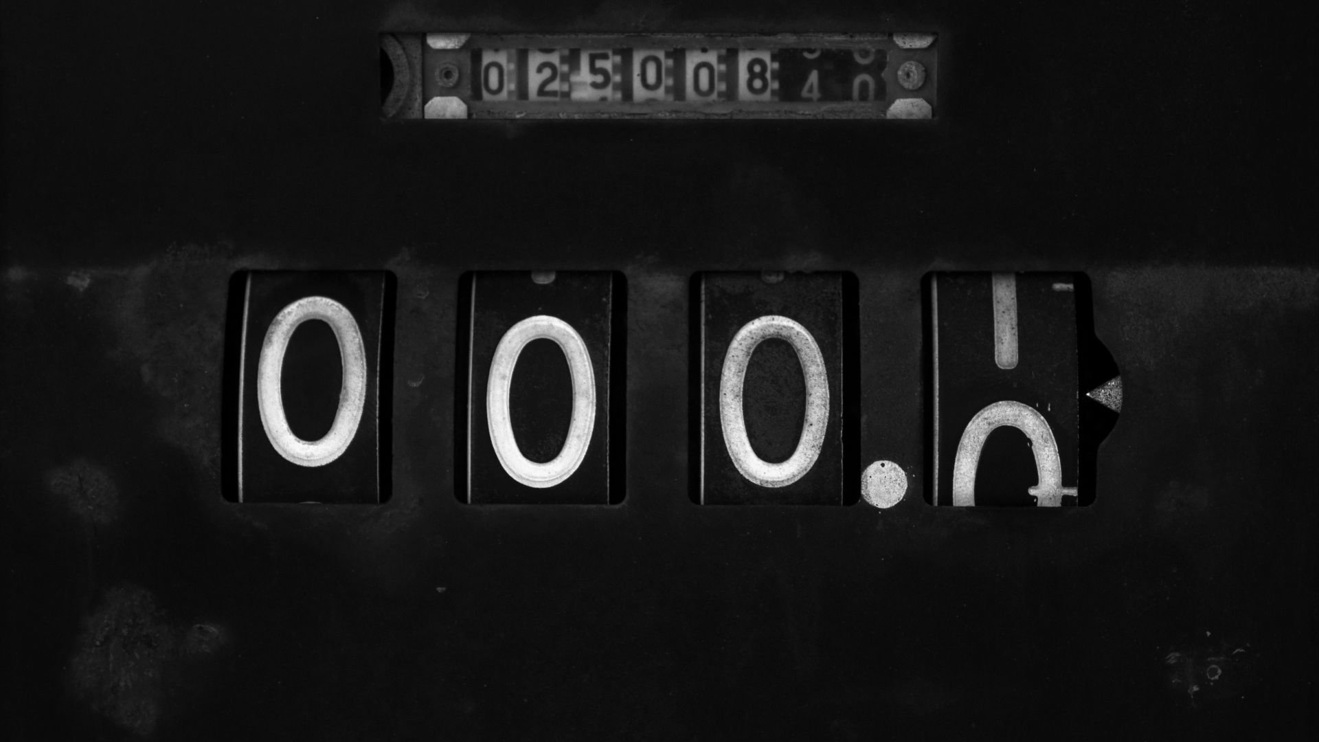 a black and white photo of the word boo on a machine