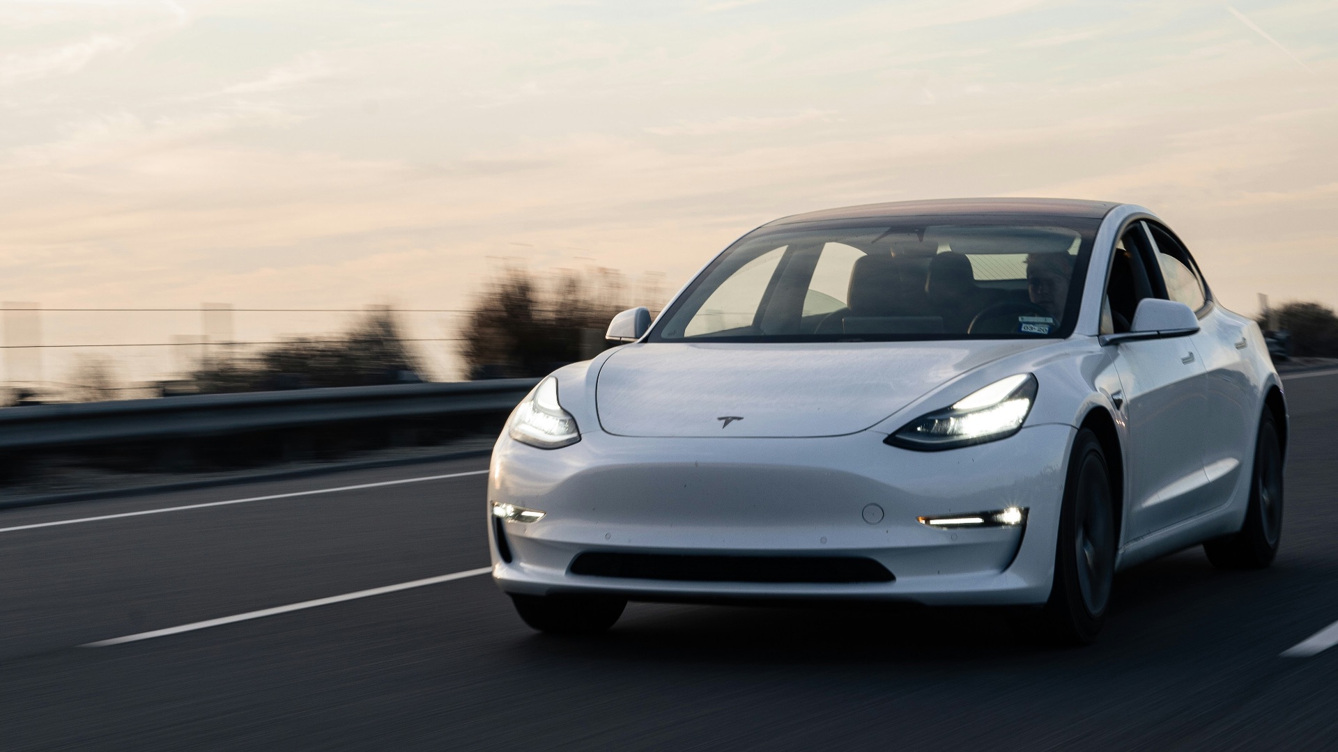 white bmw m 3 on road