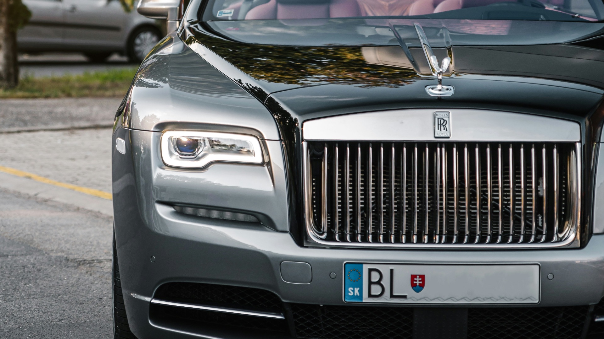black audi a 4 on road during daytime