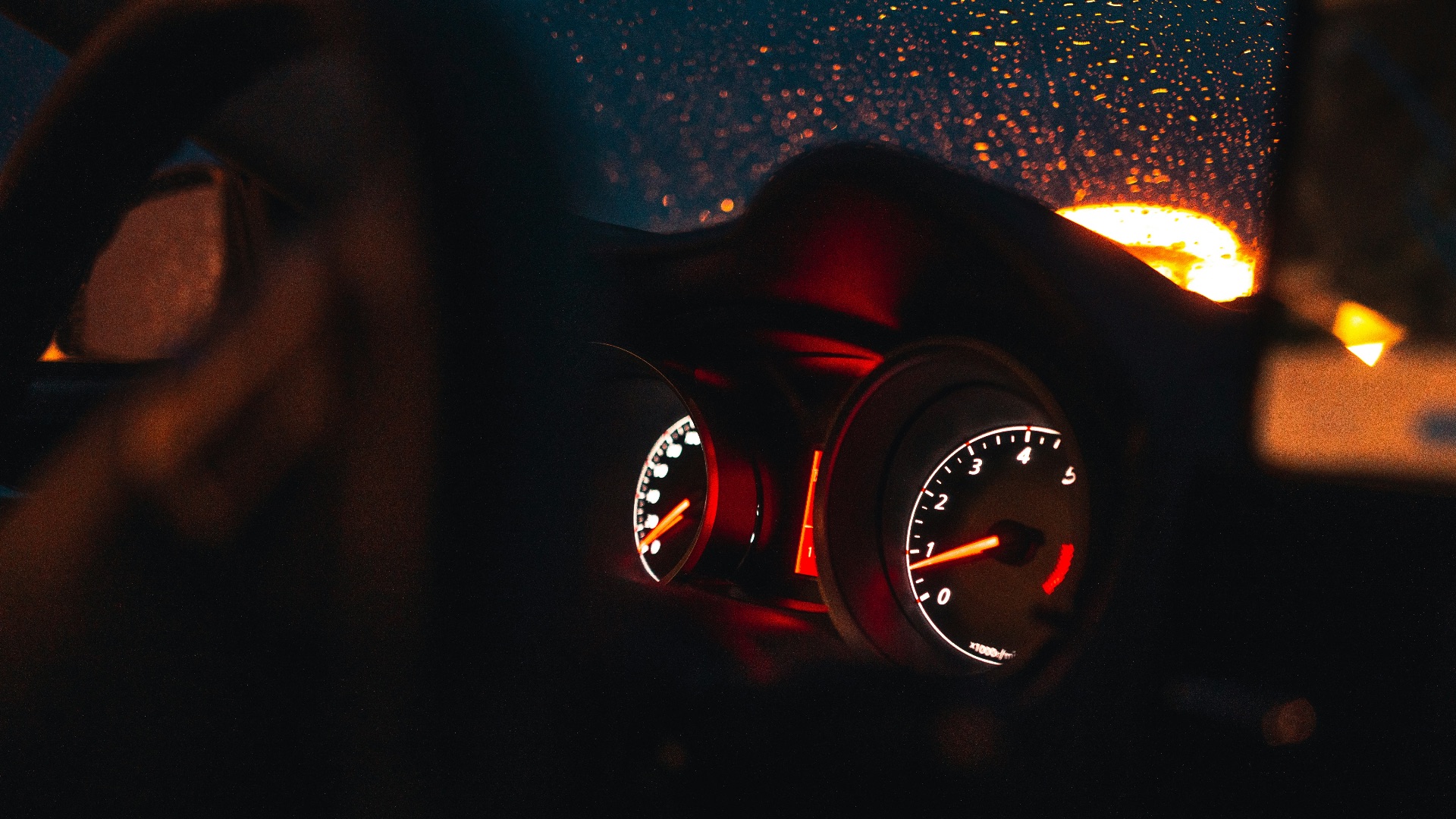 red and black analog watch