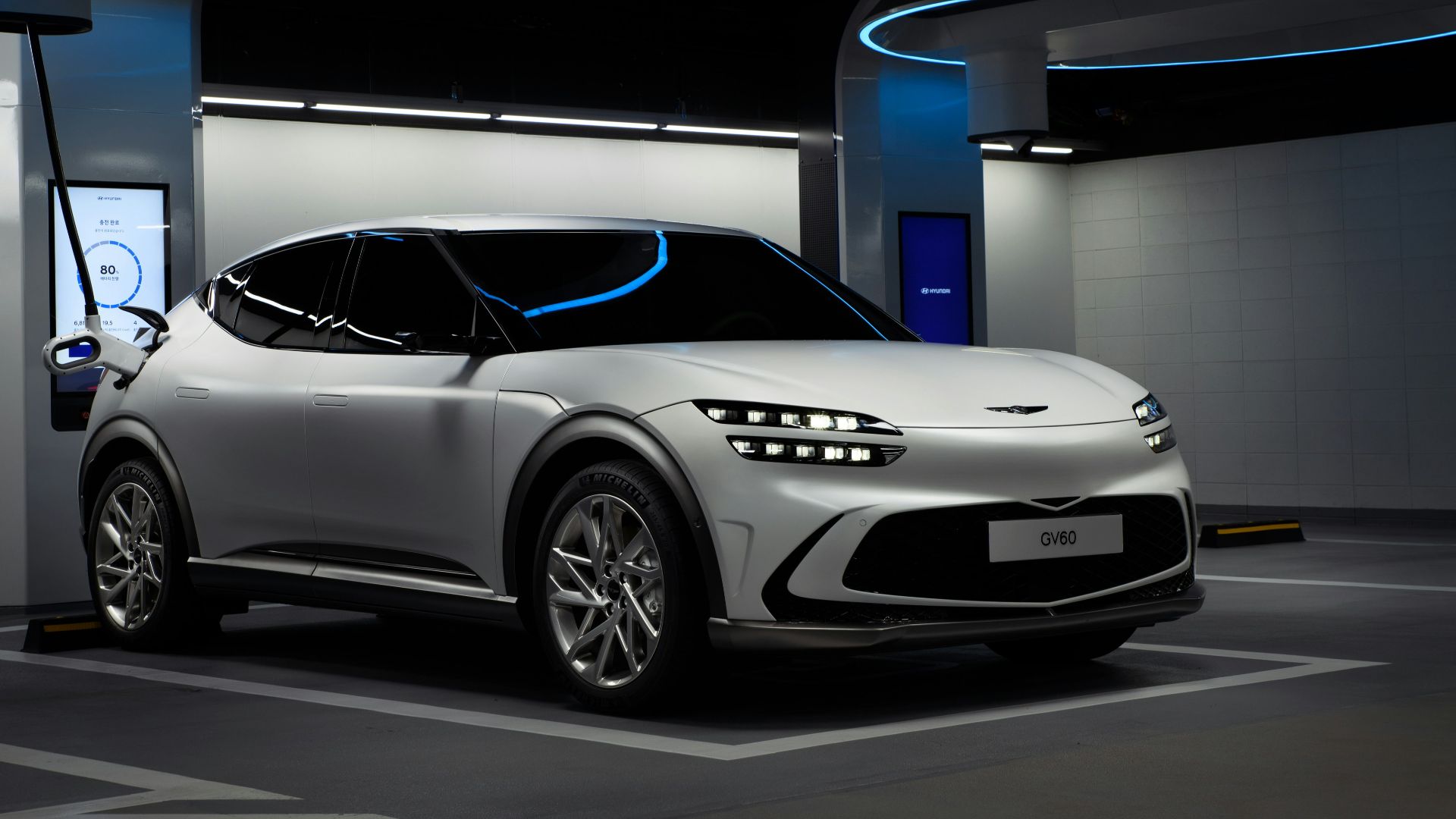 a white sports car in a showroom