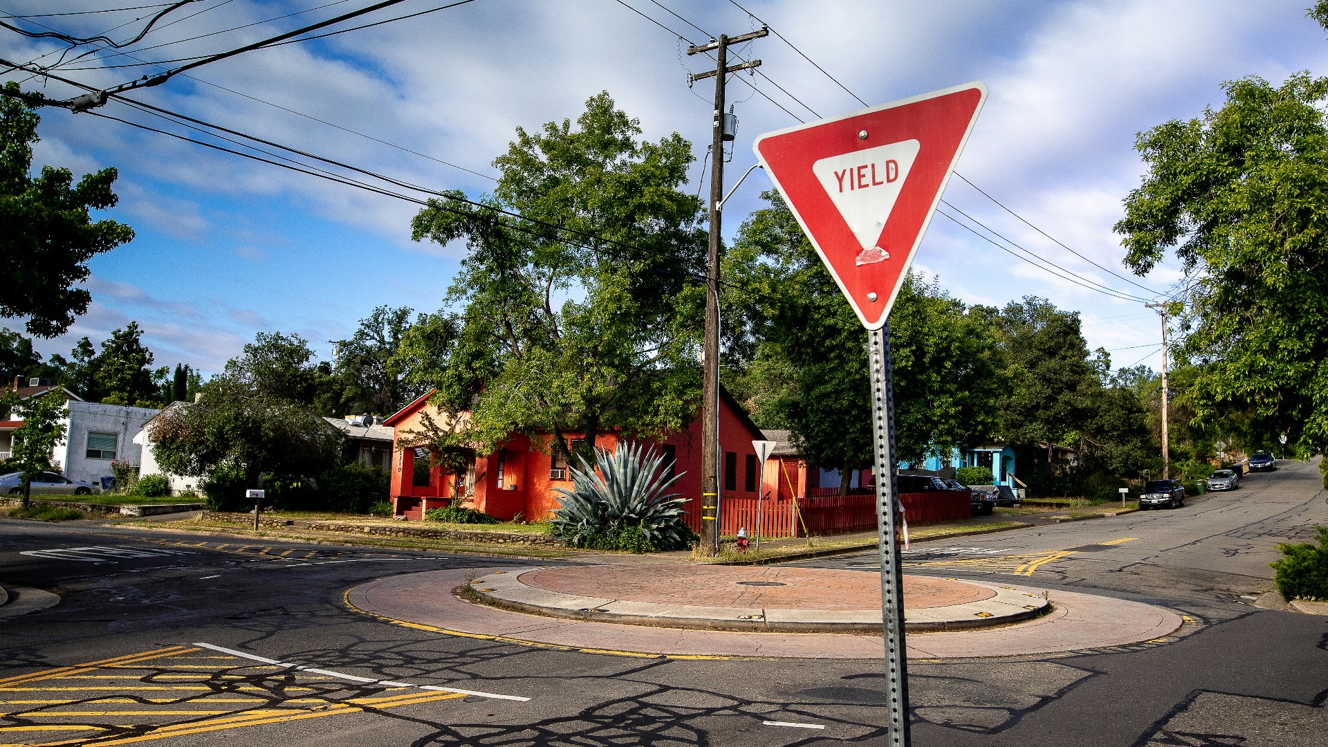 red street signage on focus photography