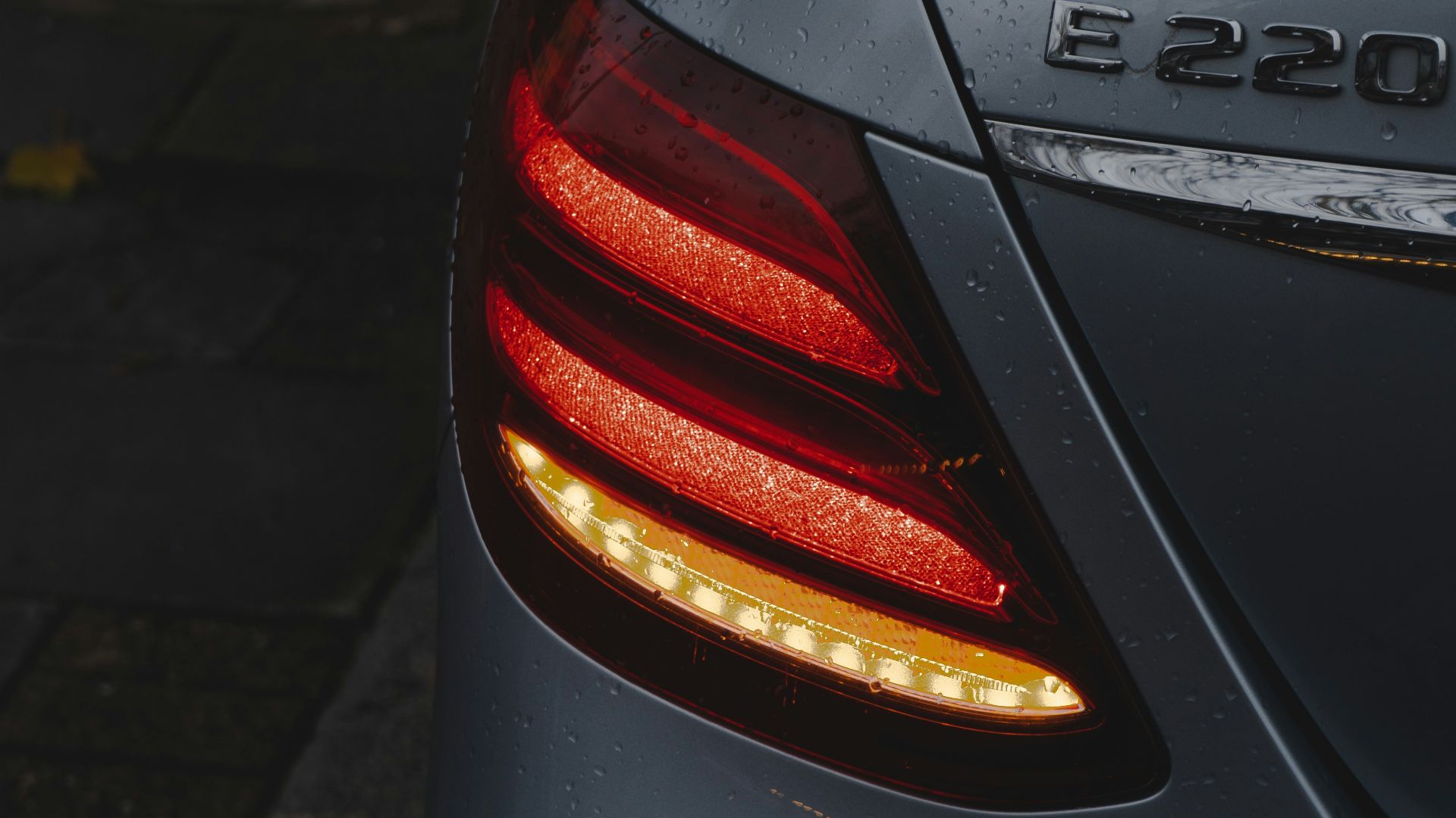 black car on gray concrete road
