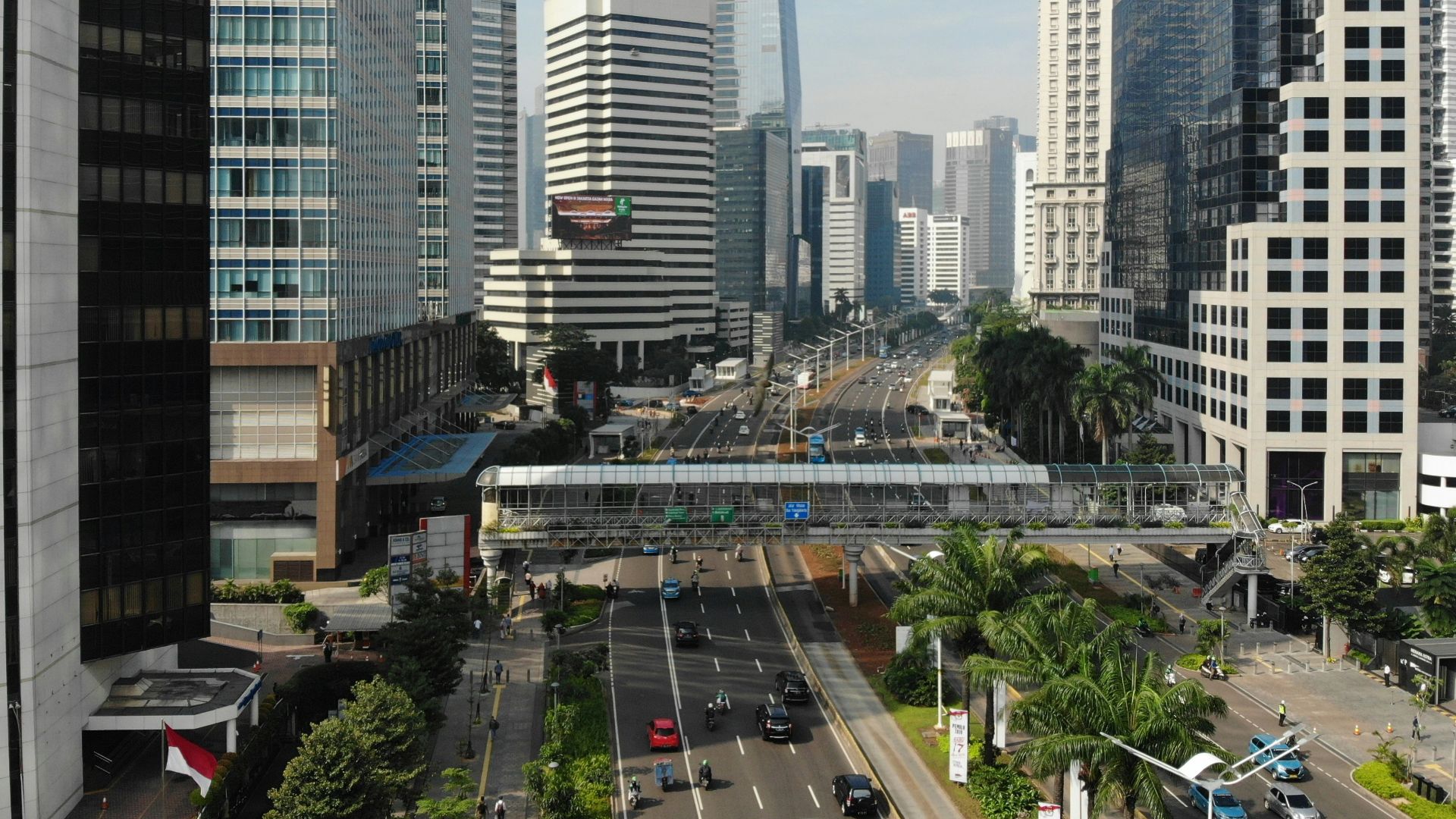 vehicle beside concrete building during daytime