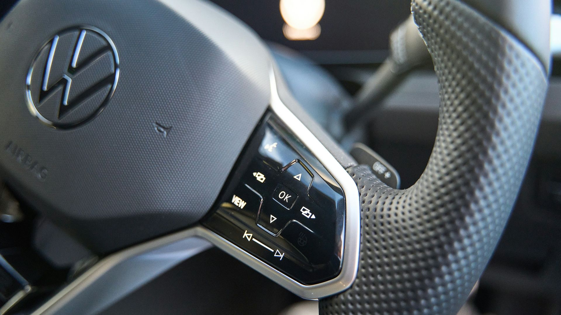 a close up of a car steering wheel