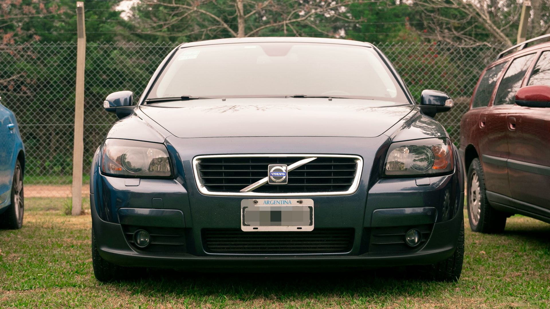 a couple of cars parked next to each other