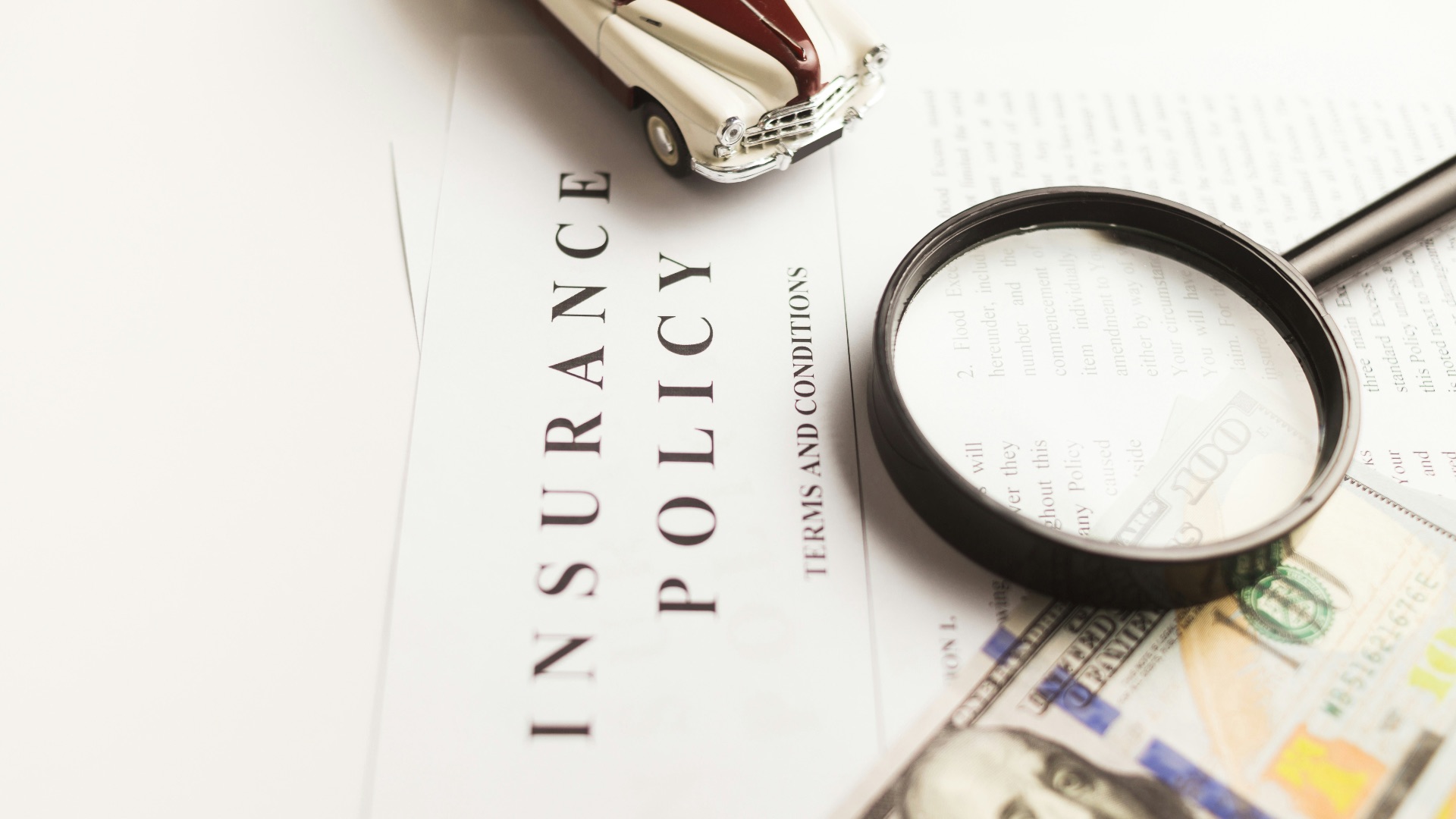 a magnifying glass sitting on top of a piece of paper