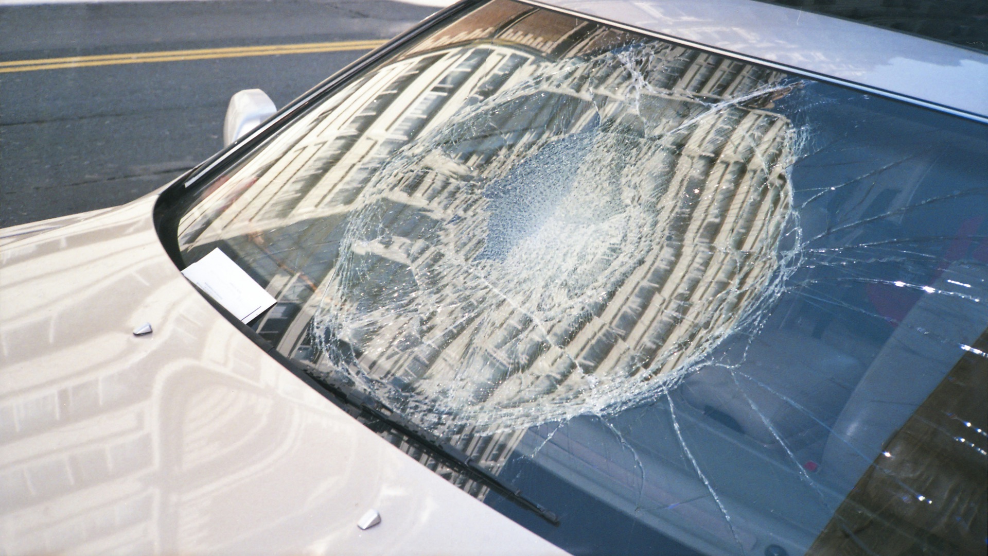 blue car with white snow on top