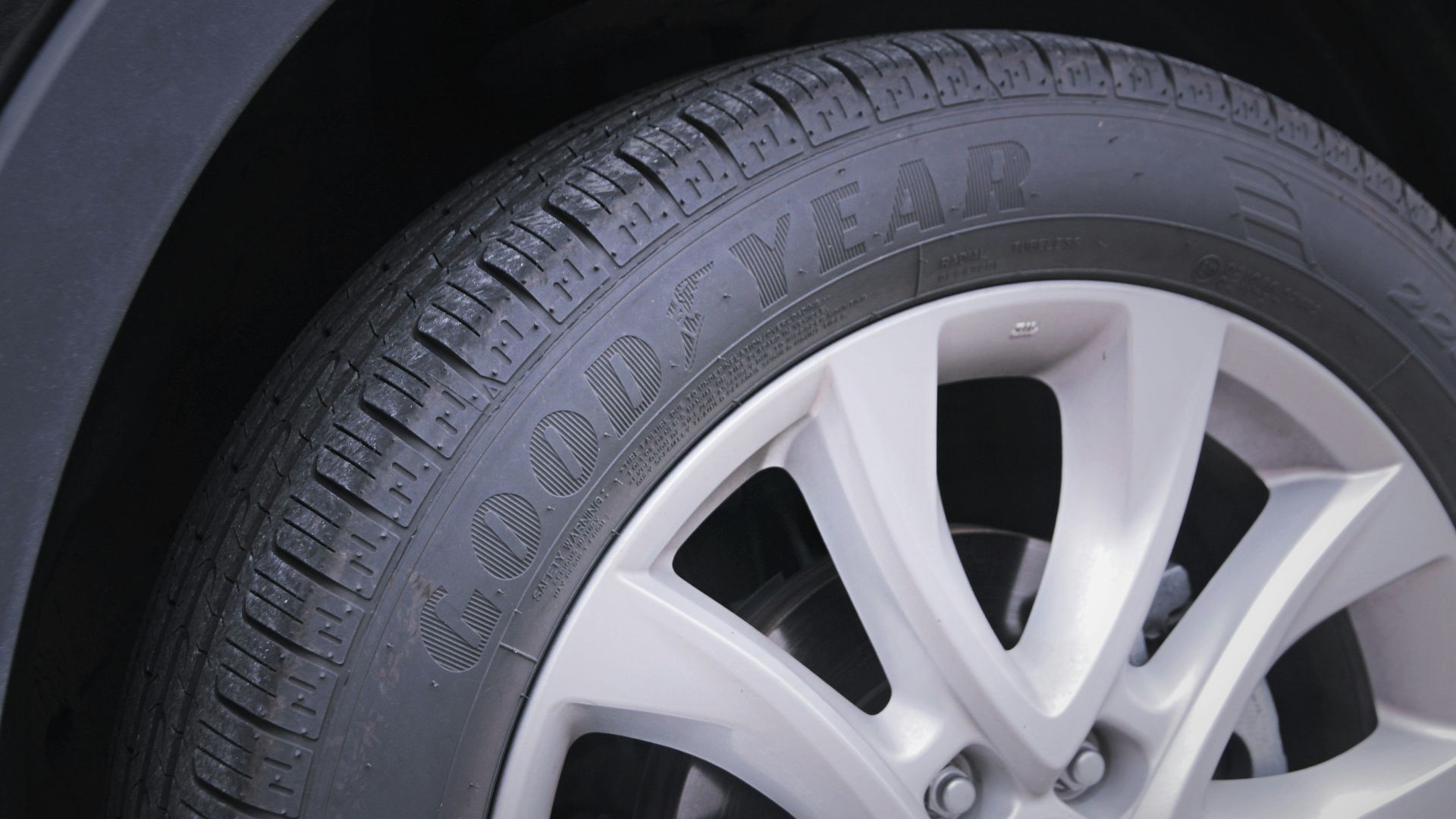 a close up of a tire on a car