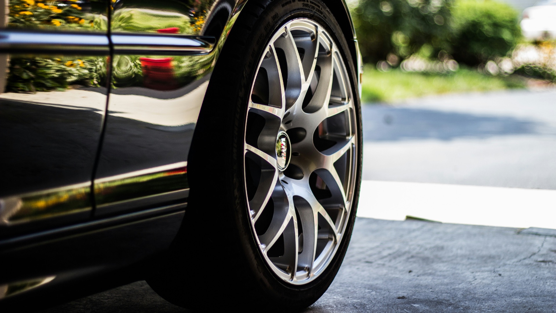 gray vehicle rim with tire