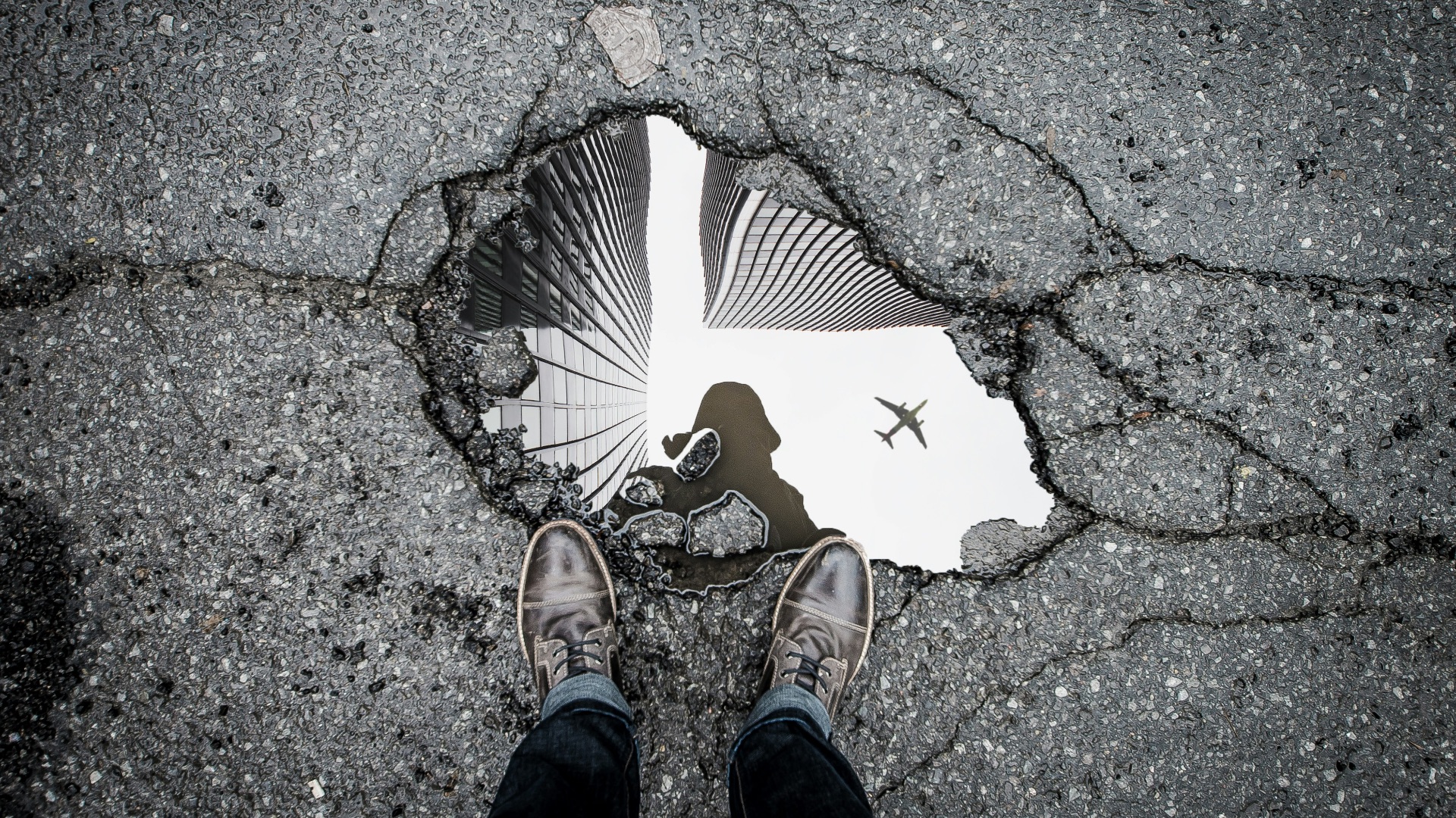 person standing in front of body of water