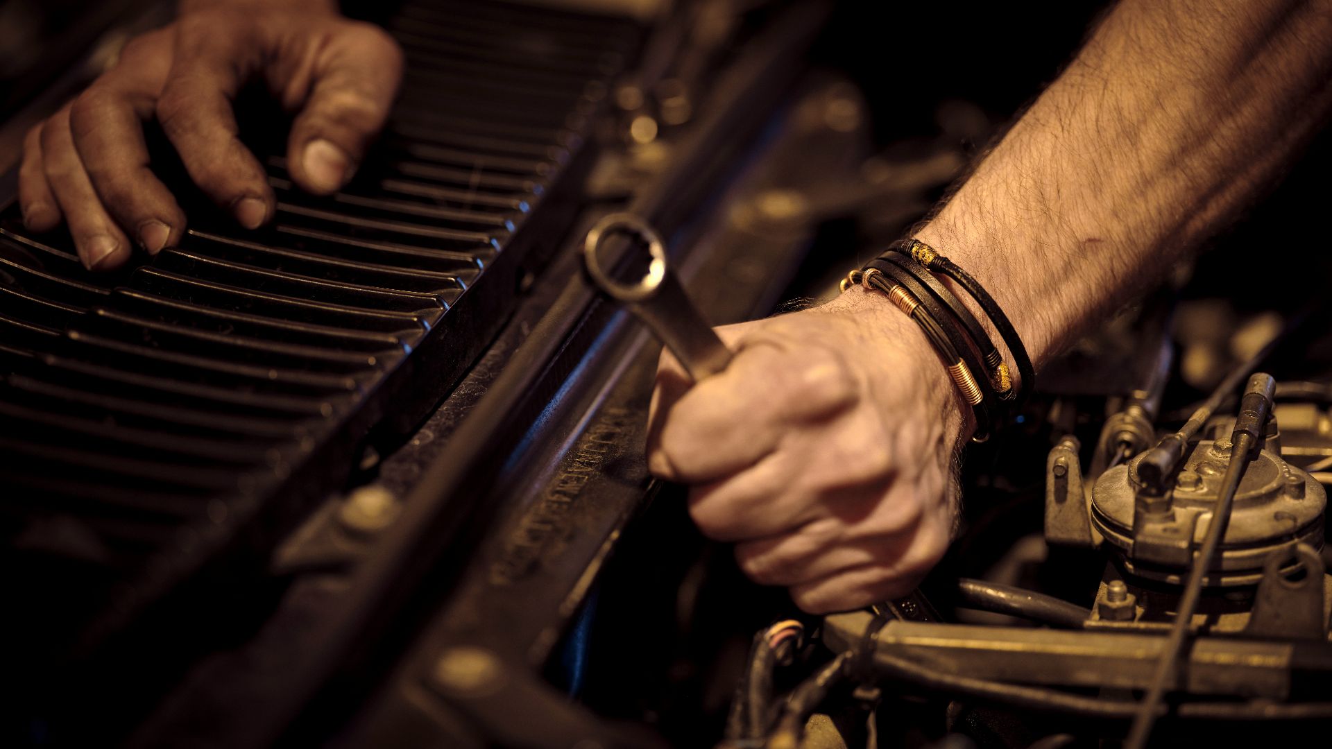 grayscale photo of person playing piano