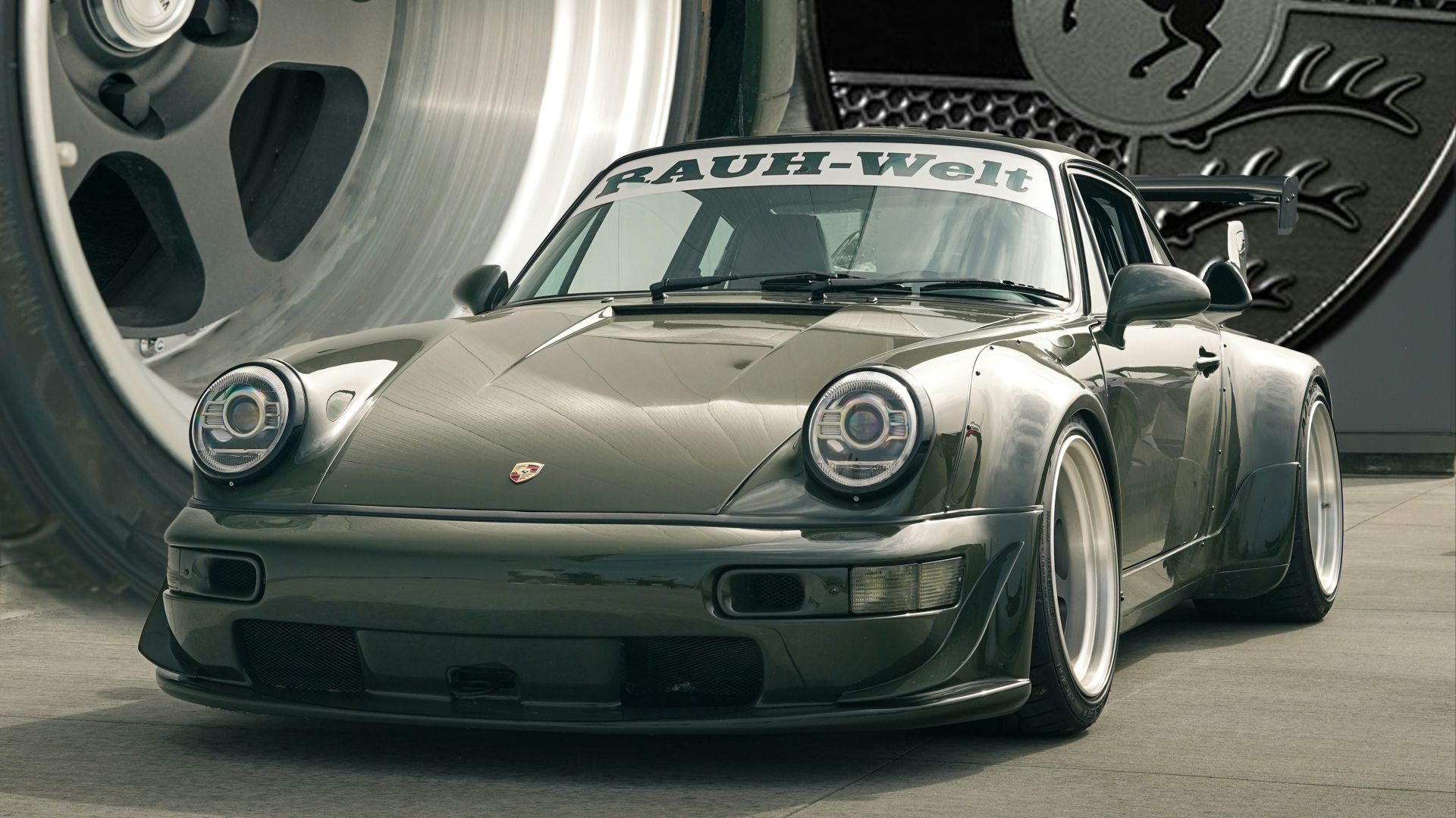 A classic porsche sports car sits proudly.