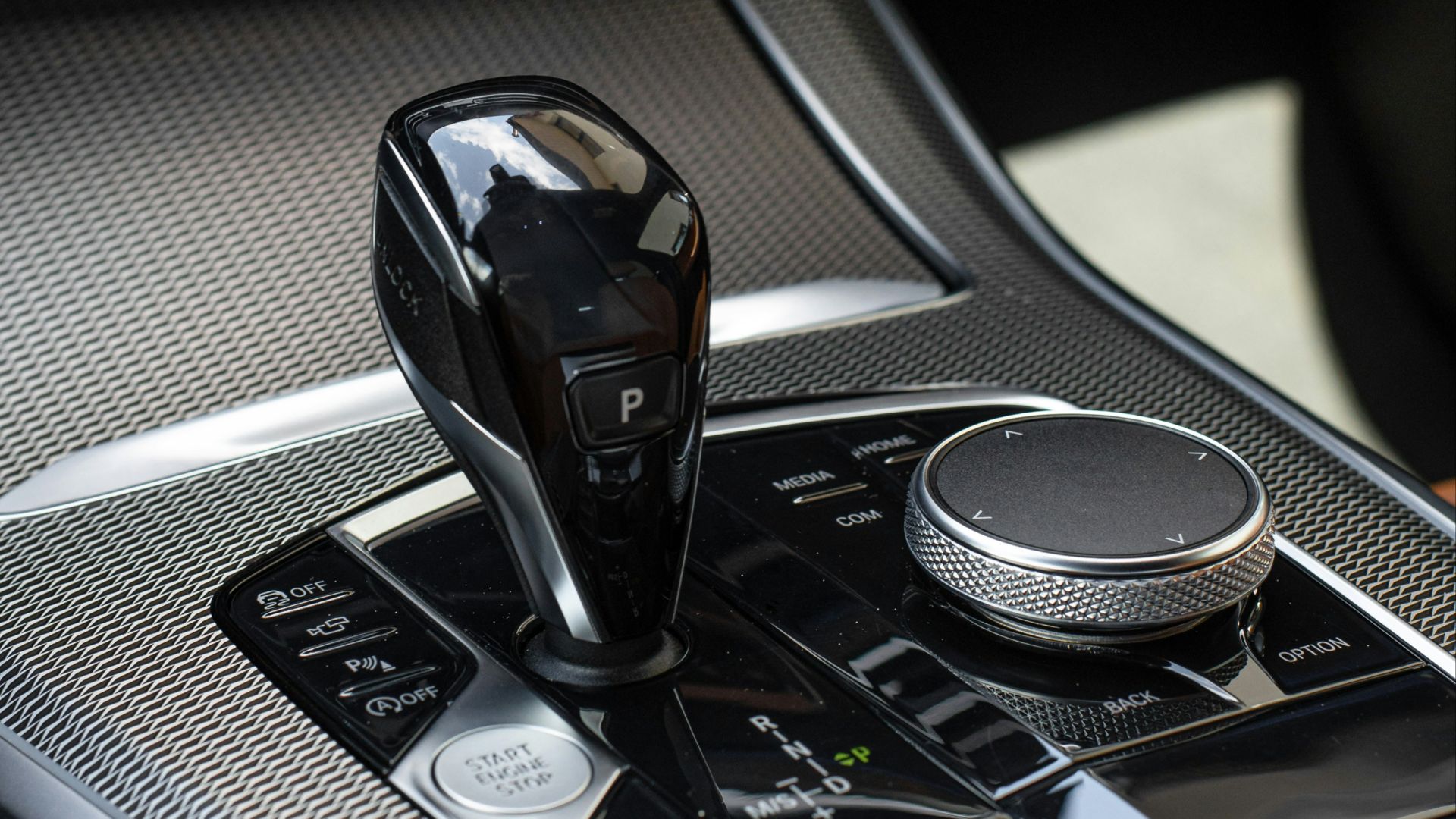 a cell phone on a car dashboard