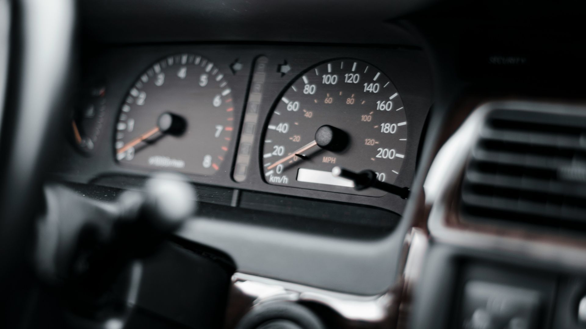 black and gray car instrument panel cluster