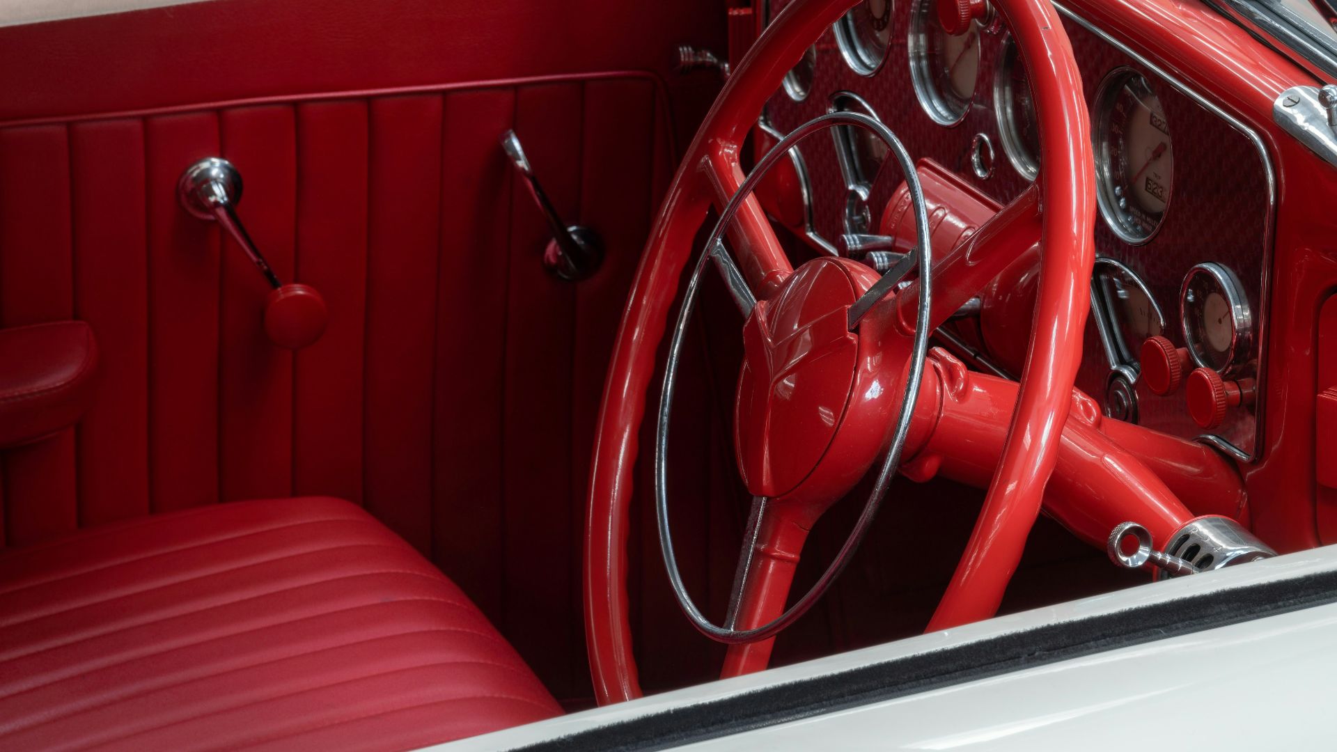 Red leather interior of a vintage car