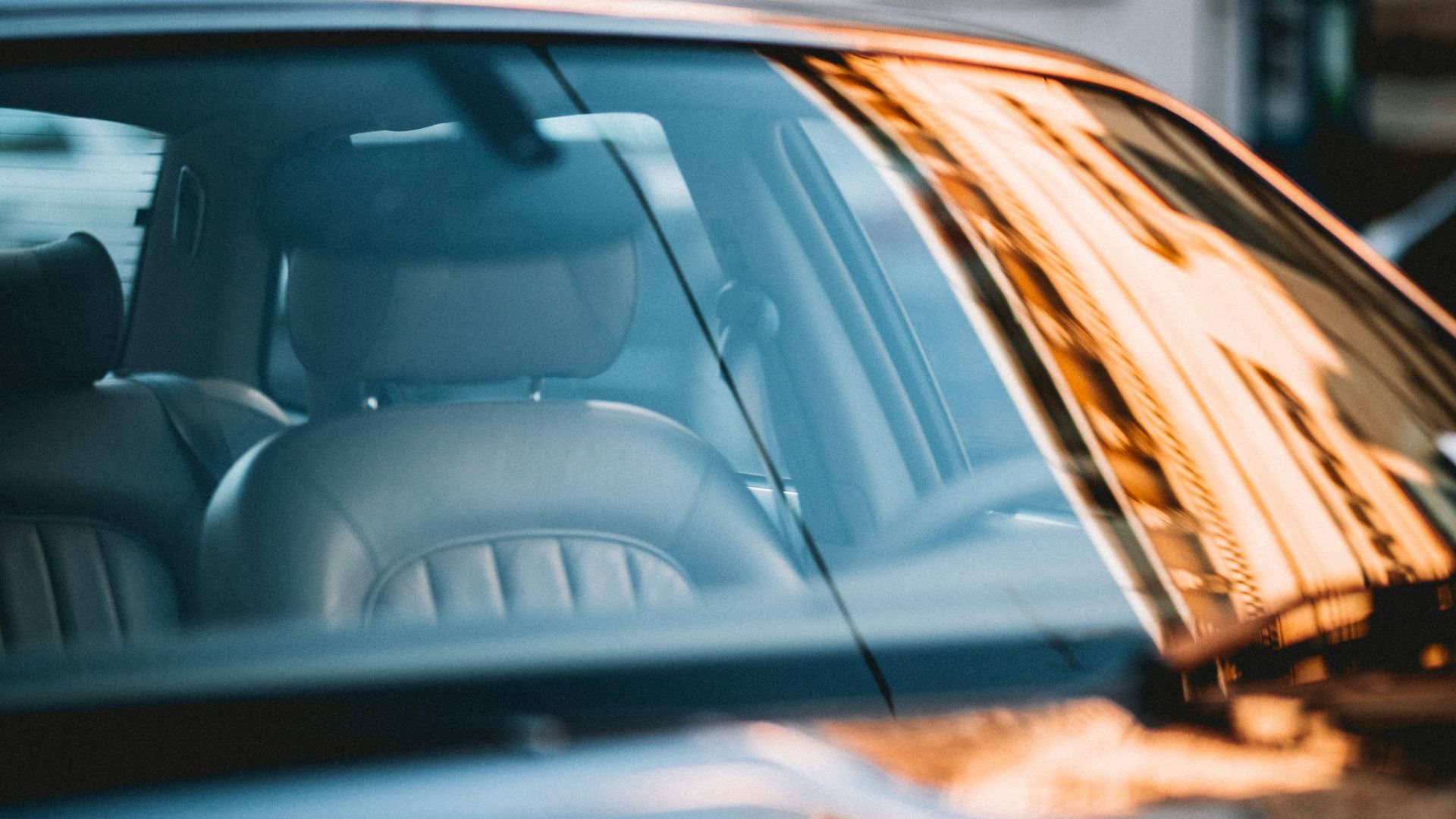 close-up photography of black vehicle during daytime