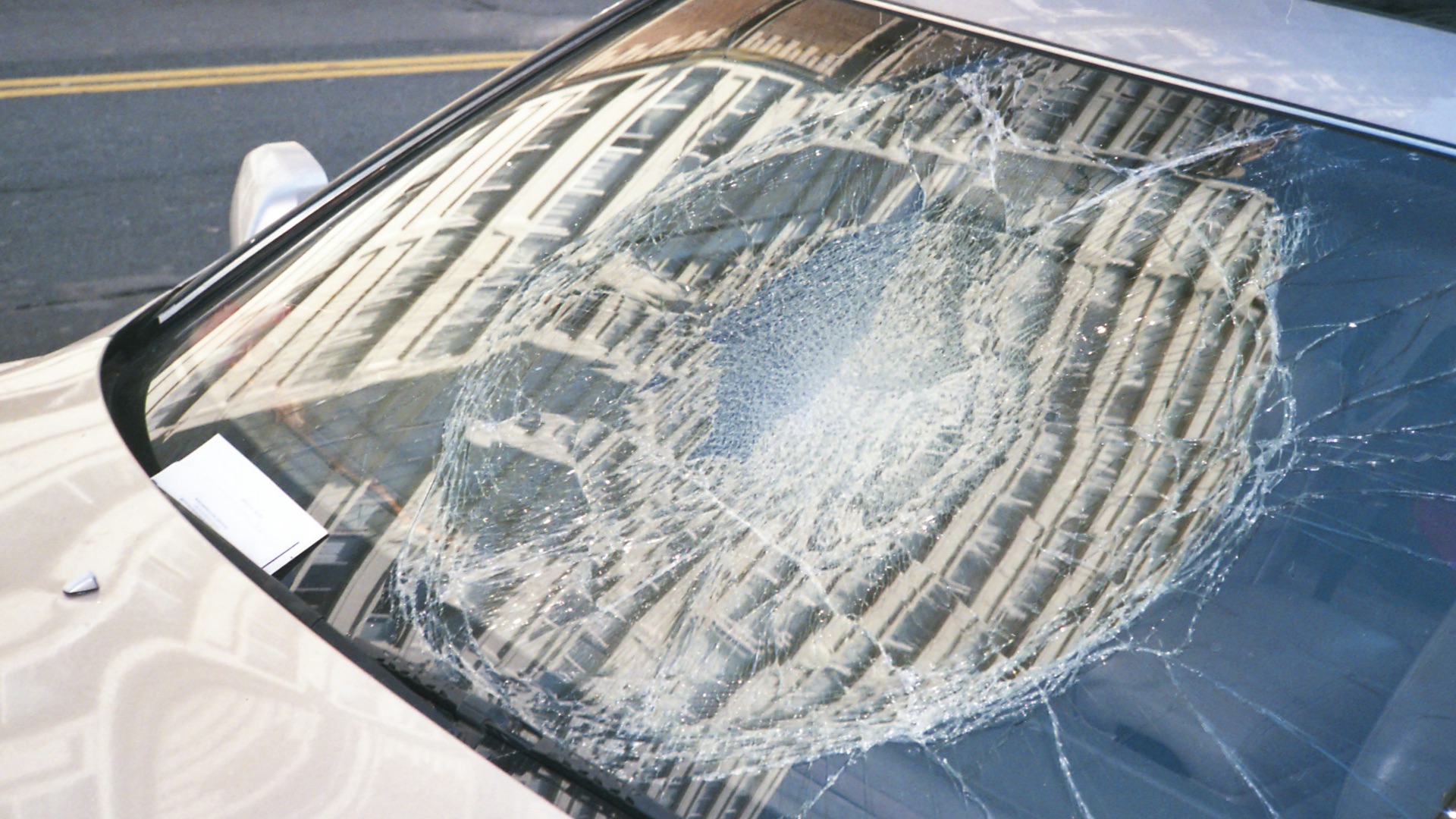 blue car with white snow on top