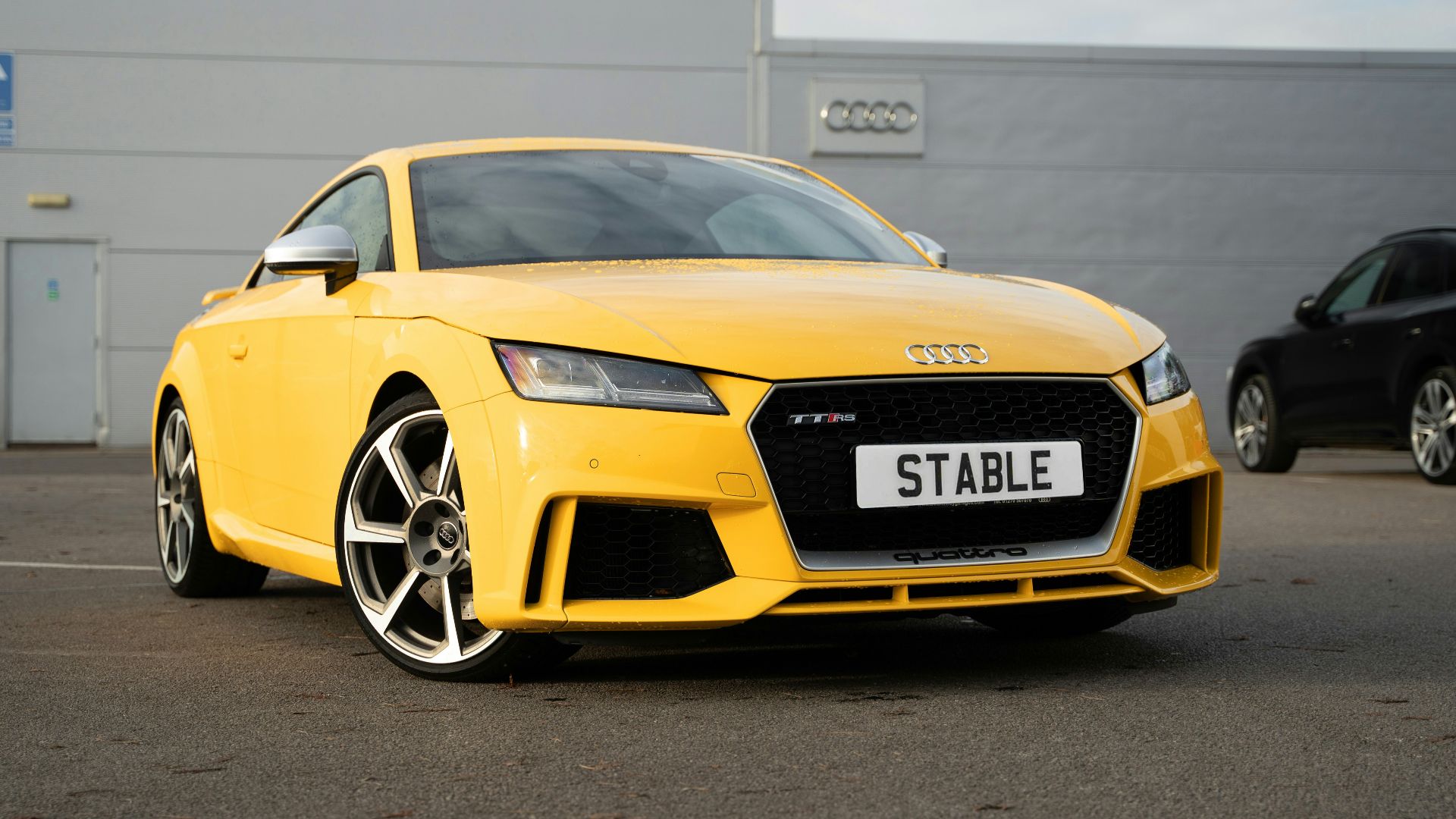 a yellow sports car