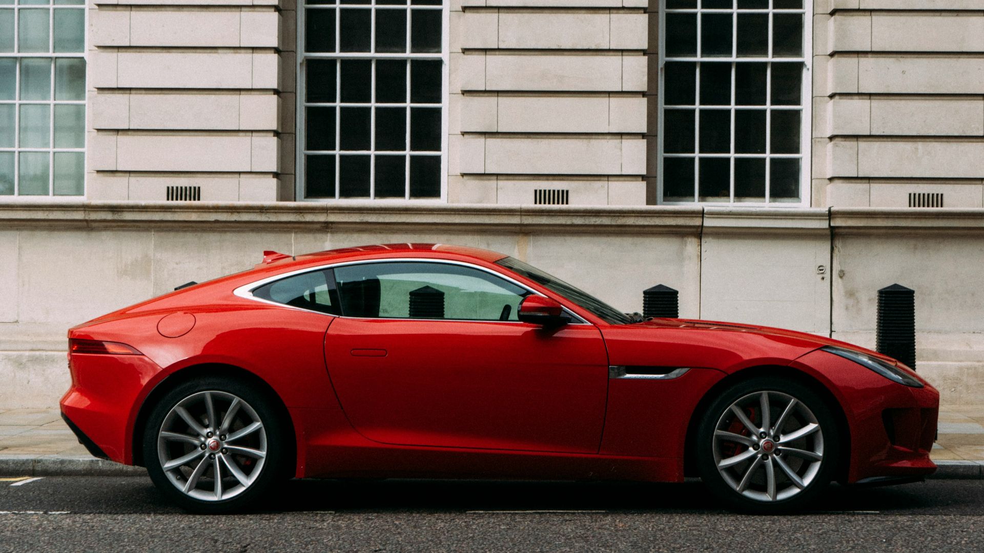 red coupe during daytime