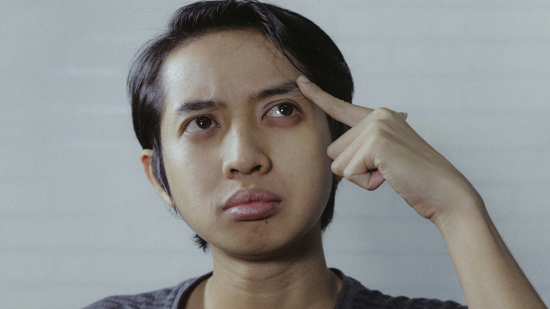 woman in gray crew neck shirt