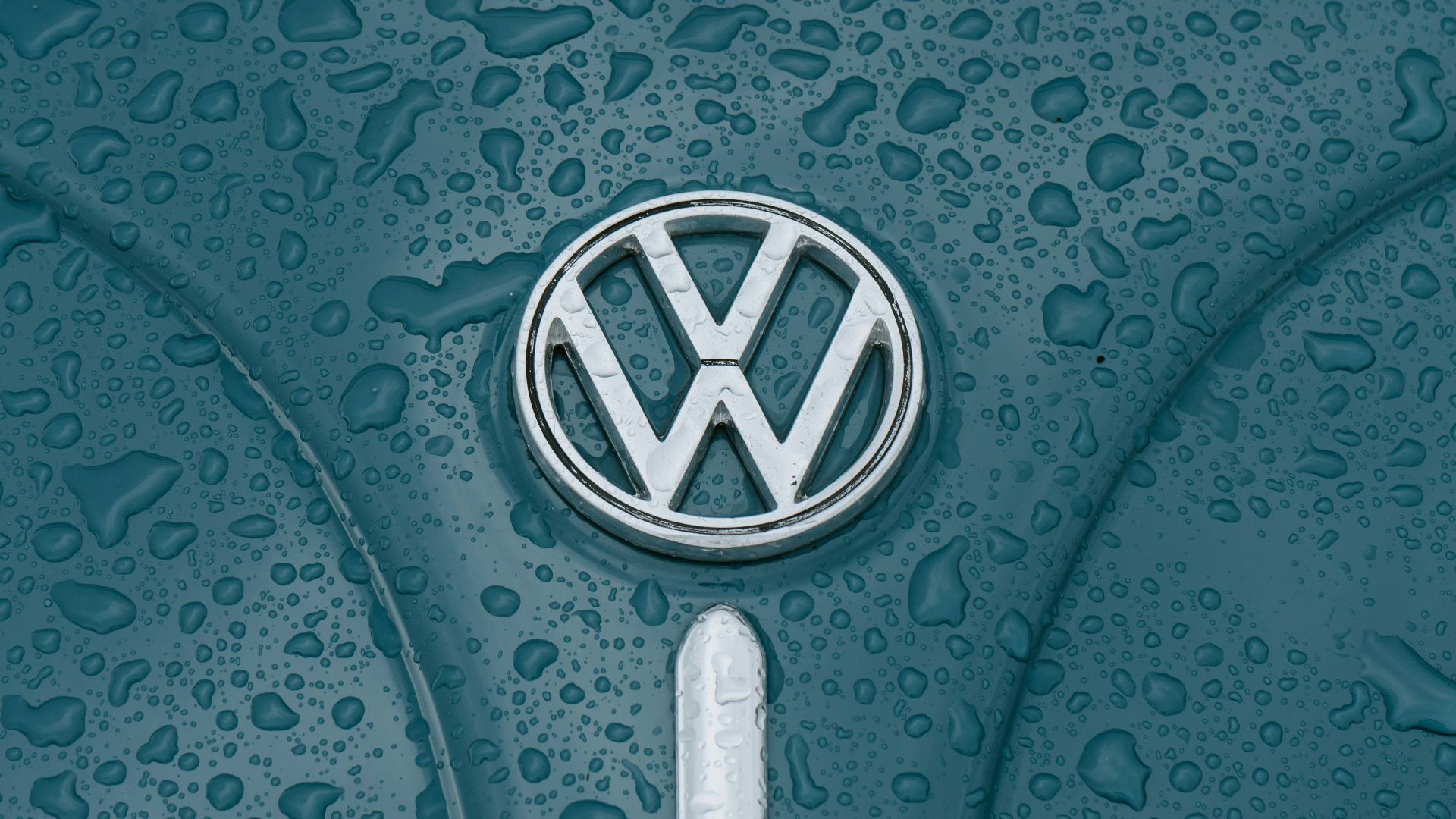 teal Volkswagen vehicle