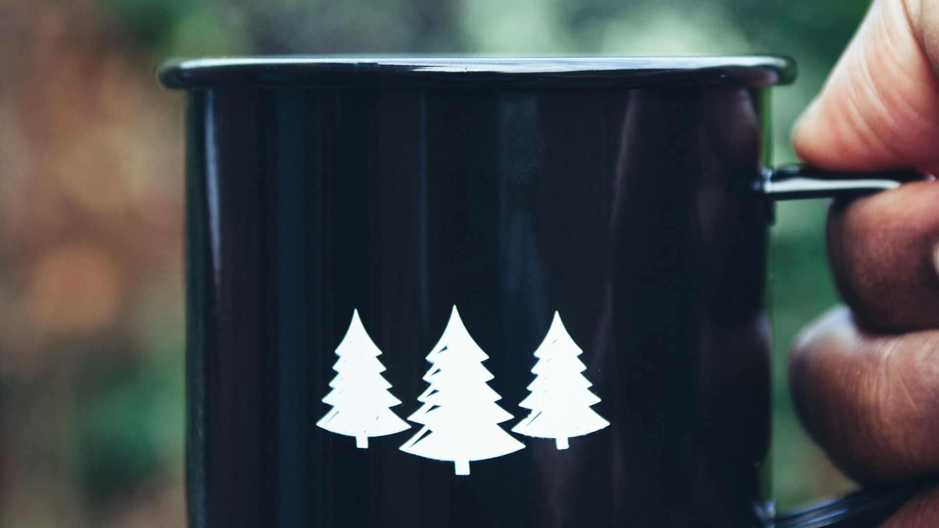 selective focus photography black and white mug